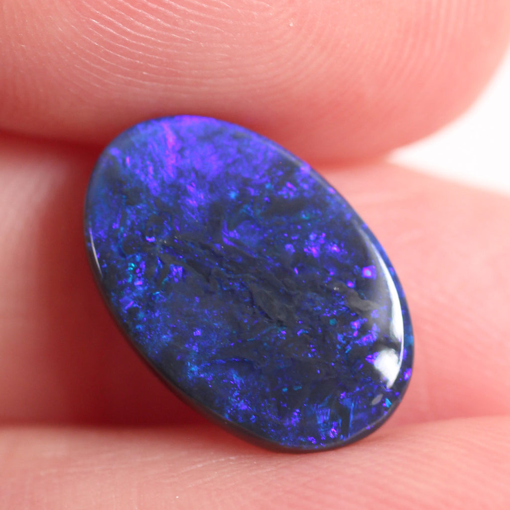 2.7ct Black Opal - 9.4 x 14 x 2.9mm
