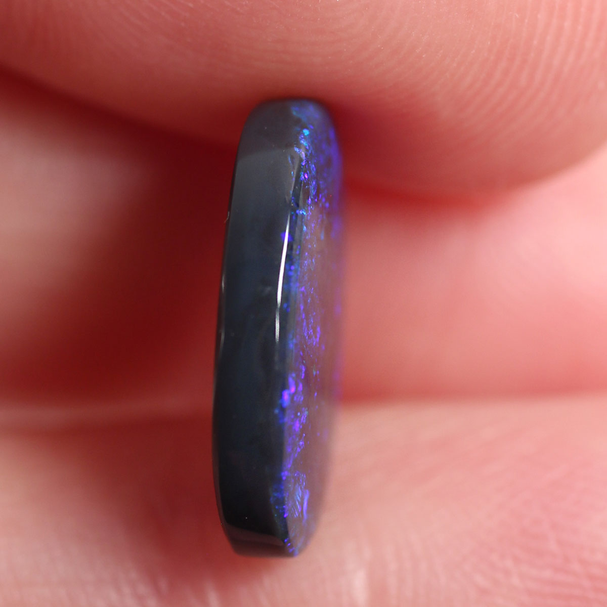 2.7ct Black Opal - 9.4 x 14 x 2.9mm