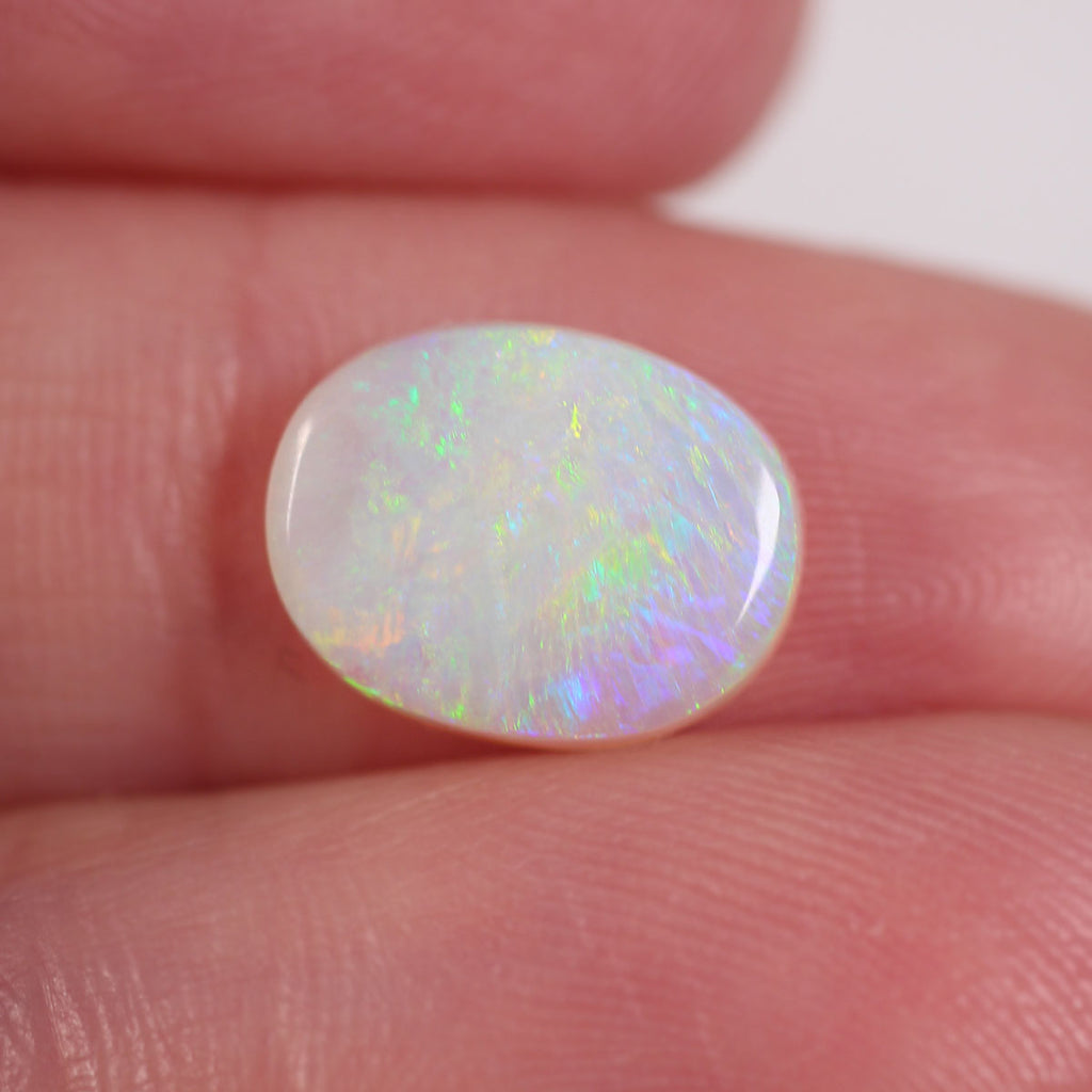Lightning Ridge light opal 2.1ct showing refined orange-green play-of-colour