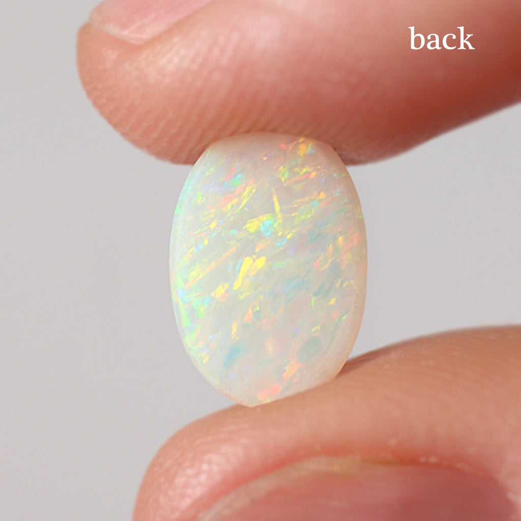 Close detail of rolling flash pattern on light opal