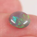 Lightning Ridge dark crystal opal 2ct showing refined green-blue play-of-colour