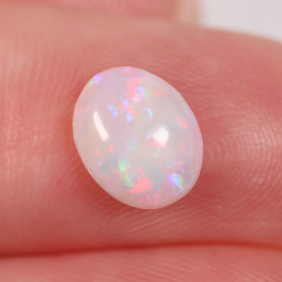 0.98ct Light Opal - 7 x 9 x 3mm