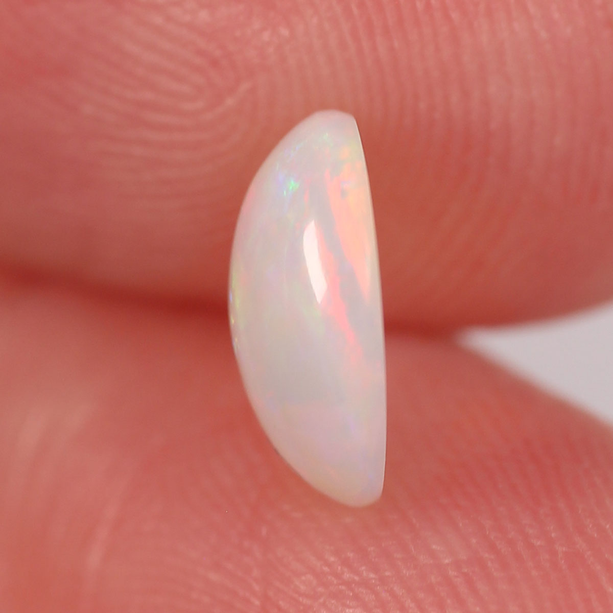 0.98ct Light Opal - 7 x 9 x 3mm