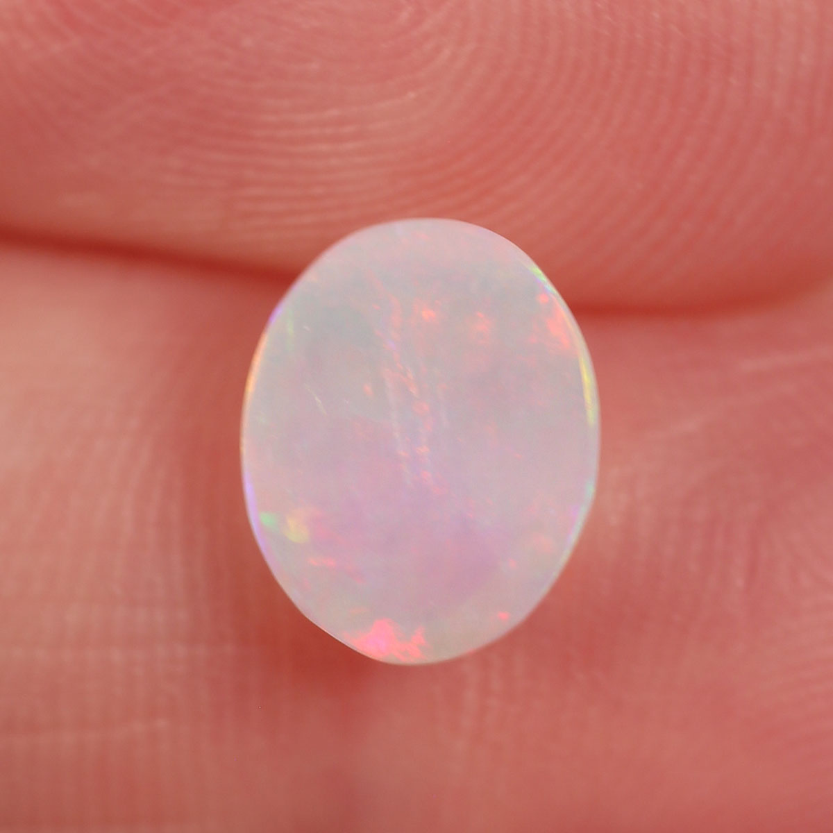 0.98ct Light Opal - 7 x 9 x 3mm