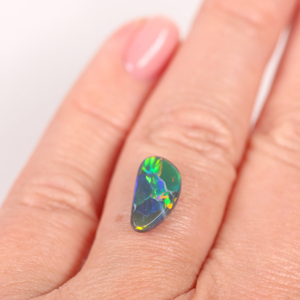 1.76ct Black Opal - 6.5 x 12 x 3.4mm