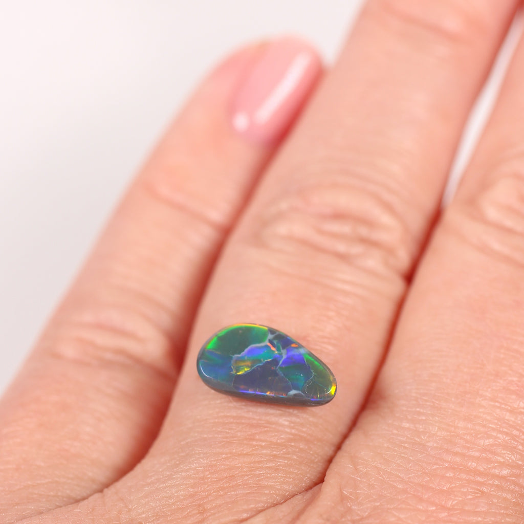 1.76ct Black Opal - 6.5 x 12 x 3.4mm