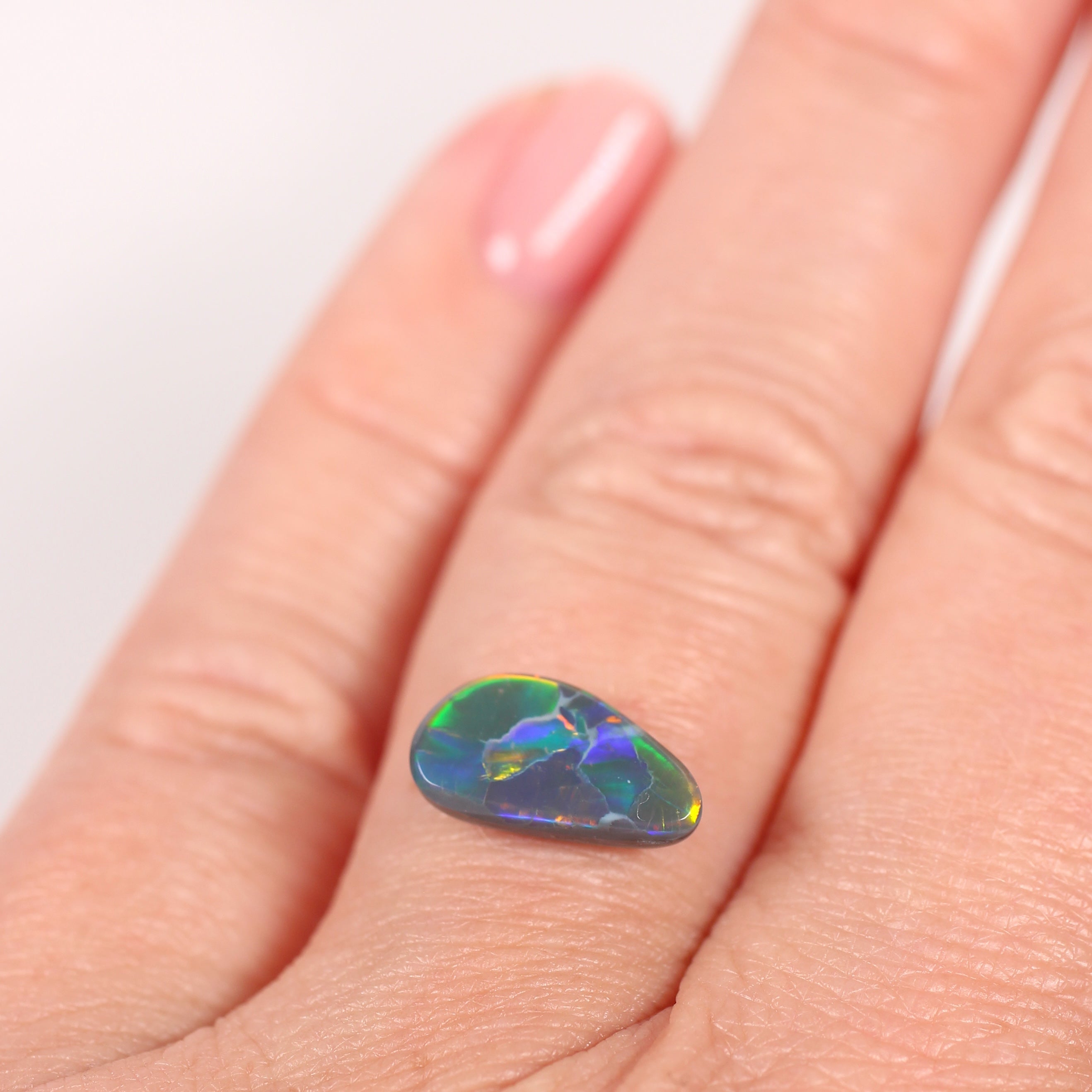 1.76ct Black Opal - 6.5 x 12 x 3.4mm