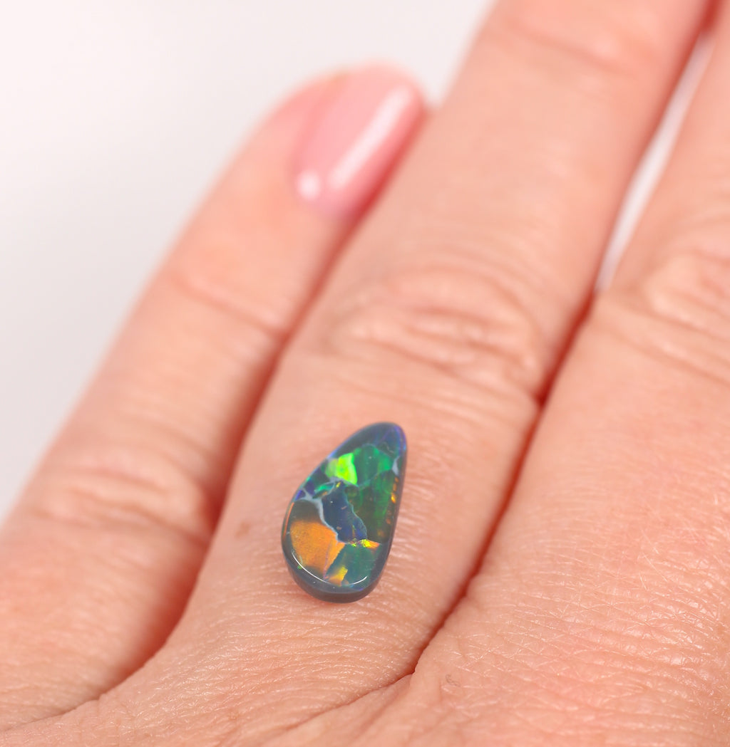 1.76ct Black Opal - 6.5 x 12 x 3.4mm