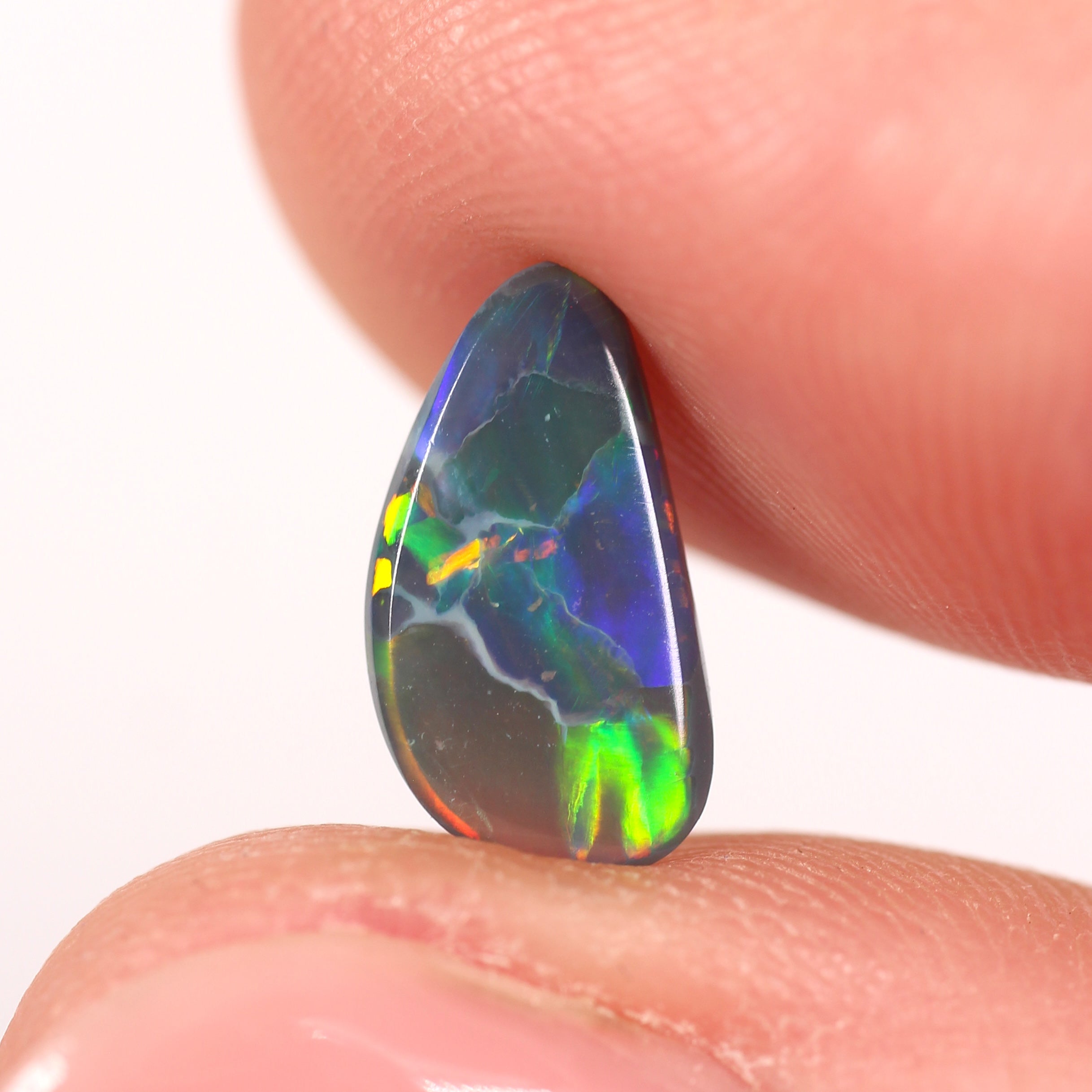 1.76ct Black Opal - 6.5 x 12 x 3.4mm