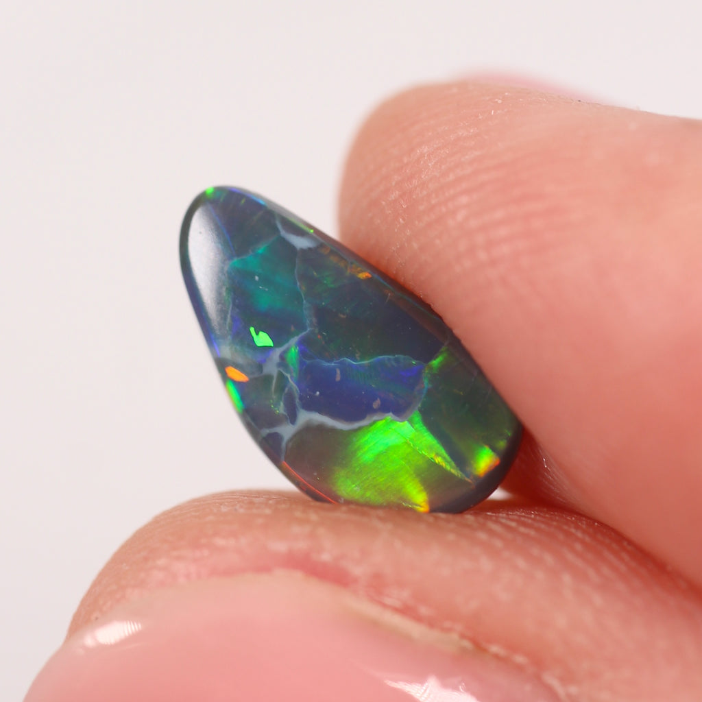 1.76ct Black Opal - 6.5 x 12 x 3.4mm