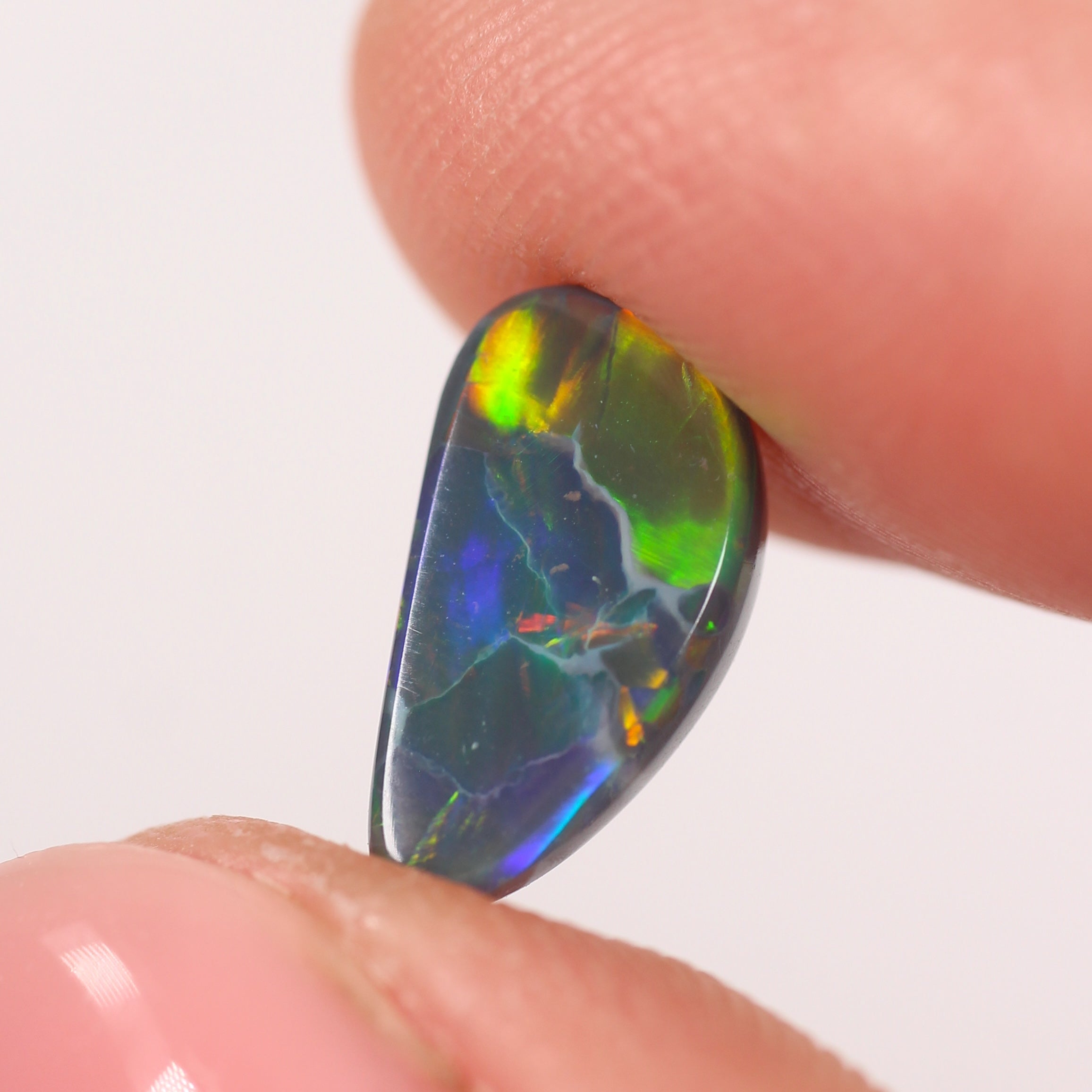 1.76ct Black Opal - 6.5 x 12 x 3.4mm