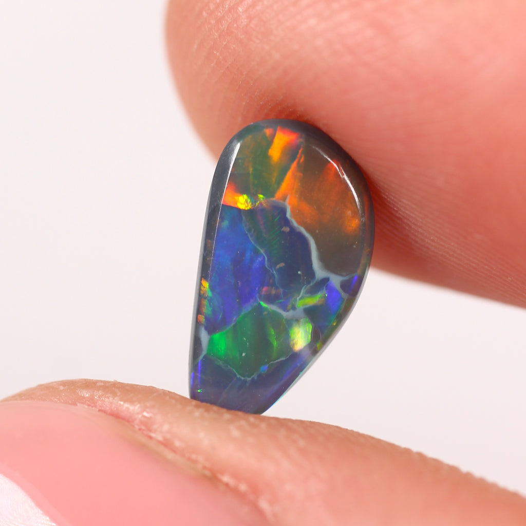 1.76ct Black Opal - 6.5 x 12 x 3.4mm