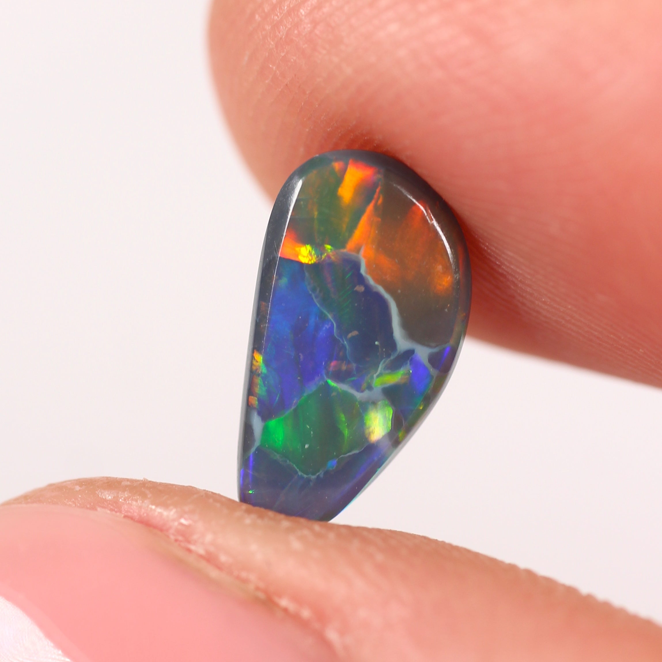 1.76ct Black Opal - 6.5 x 12 x 3.4mm