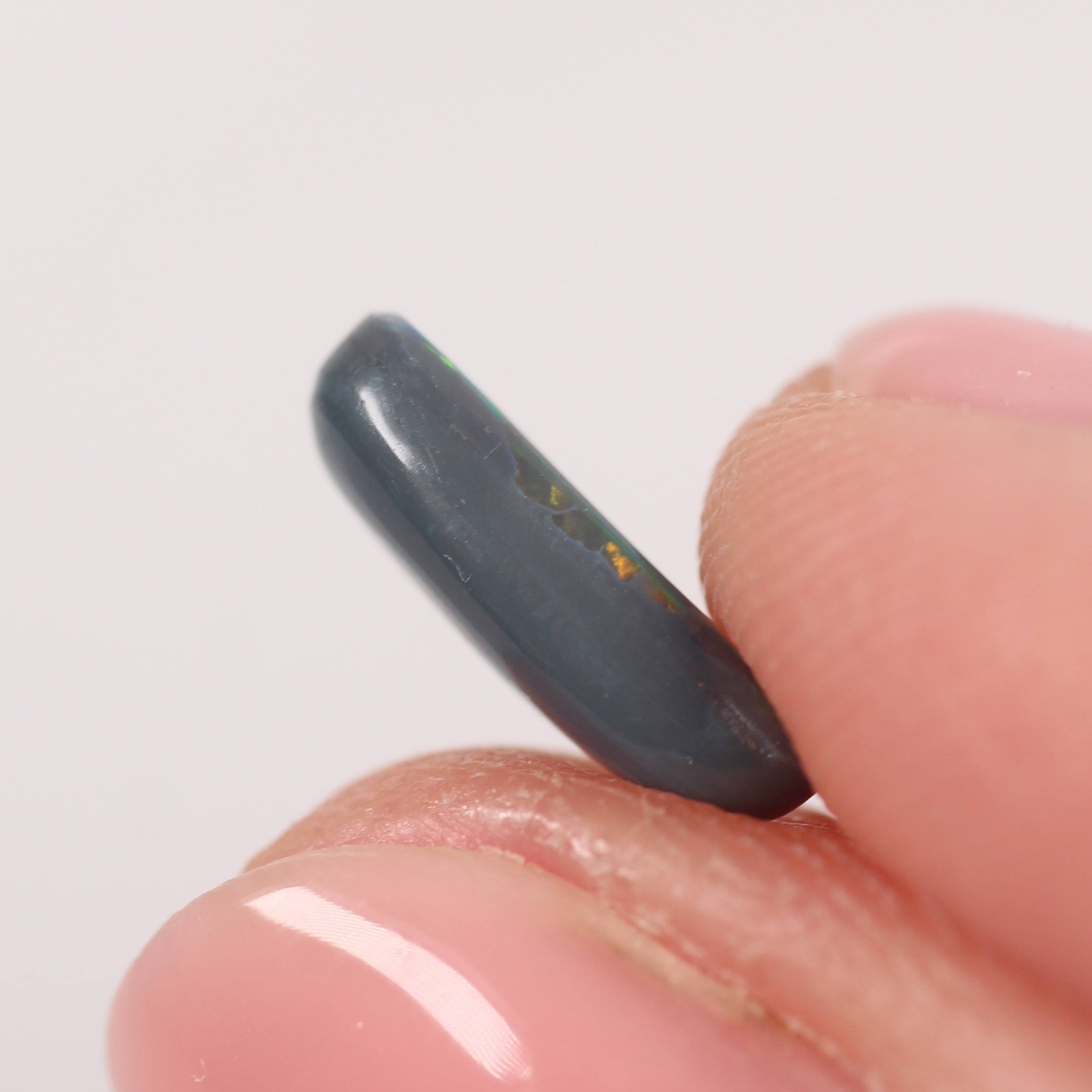 1.76ct Black Opal - 6.5 x 12 x 3.4mm