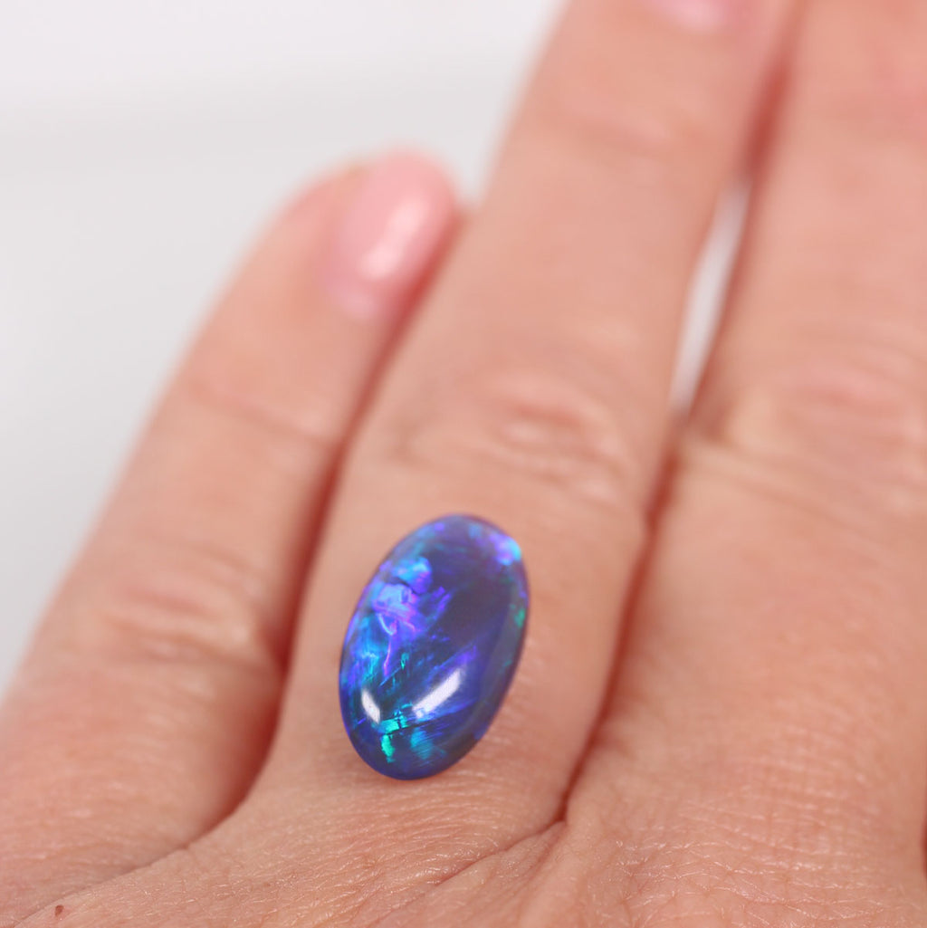 4.57ct Black Opal - 8.7 x 15.5 x 5.9mm