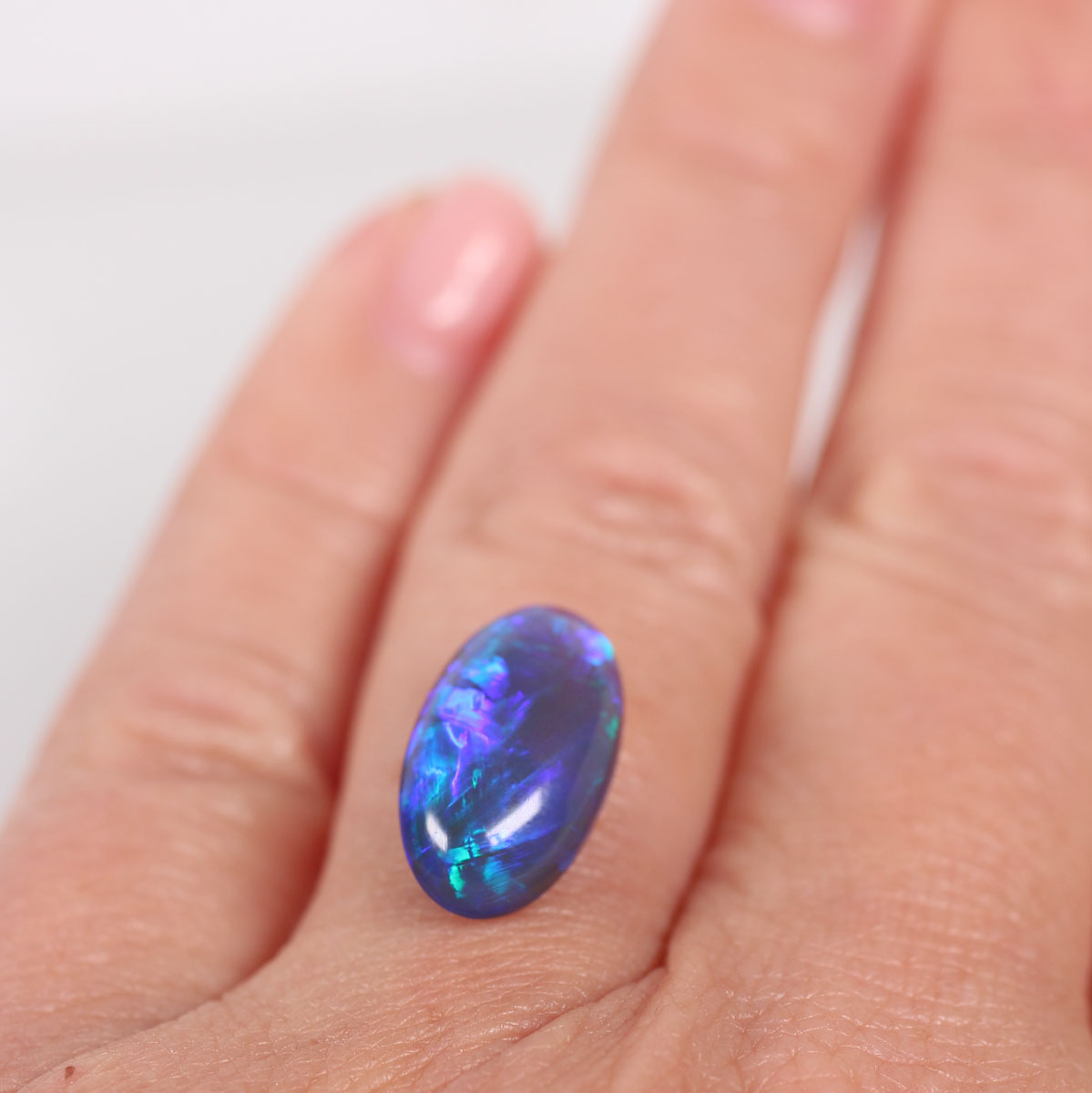 4.57ct Black Opal - 8.7 x 15.5 x 5.9mm