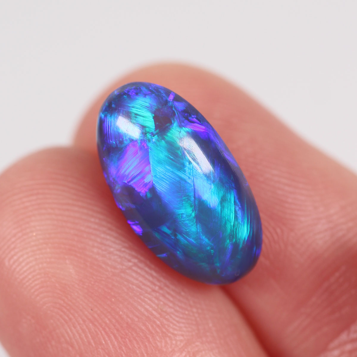 4.57ct Black Opal - 8.7 x 15.5 x 5.9mm