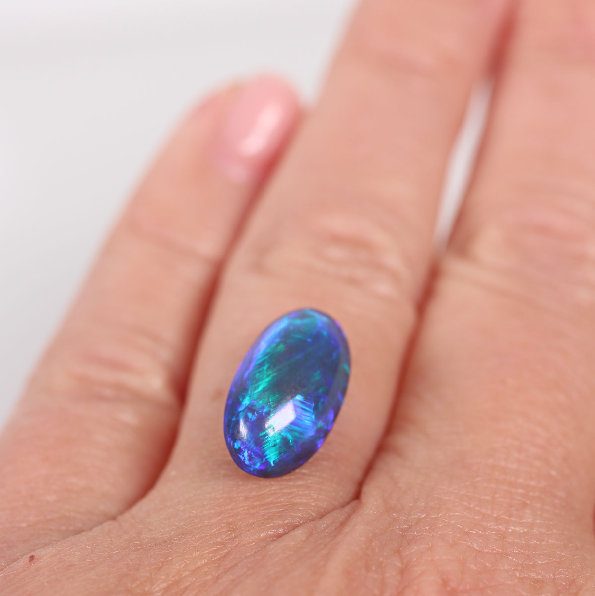 4.57ct Black Opal - 8.7 x 15.5 x 5.9mm