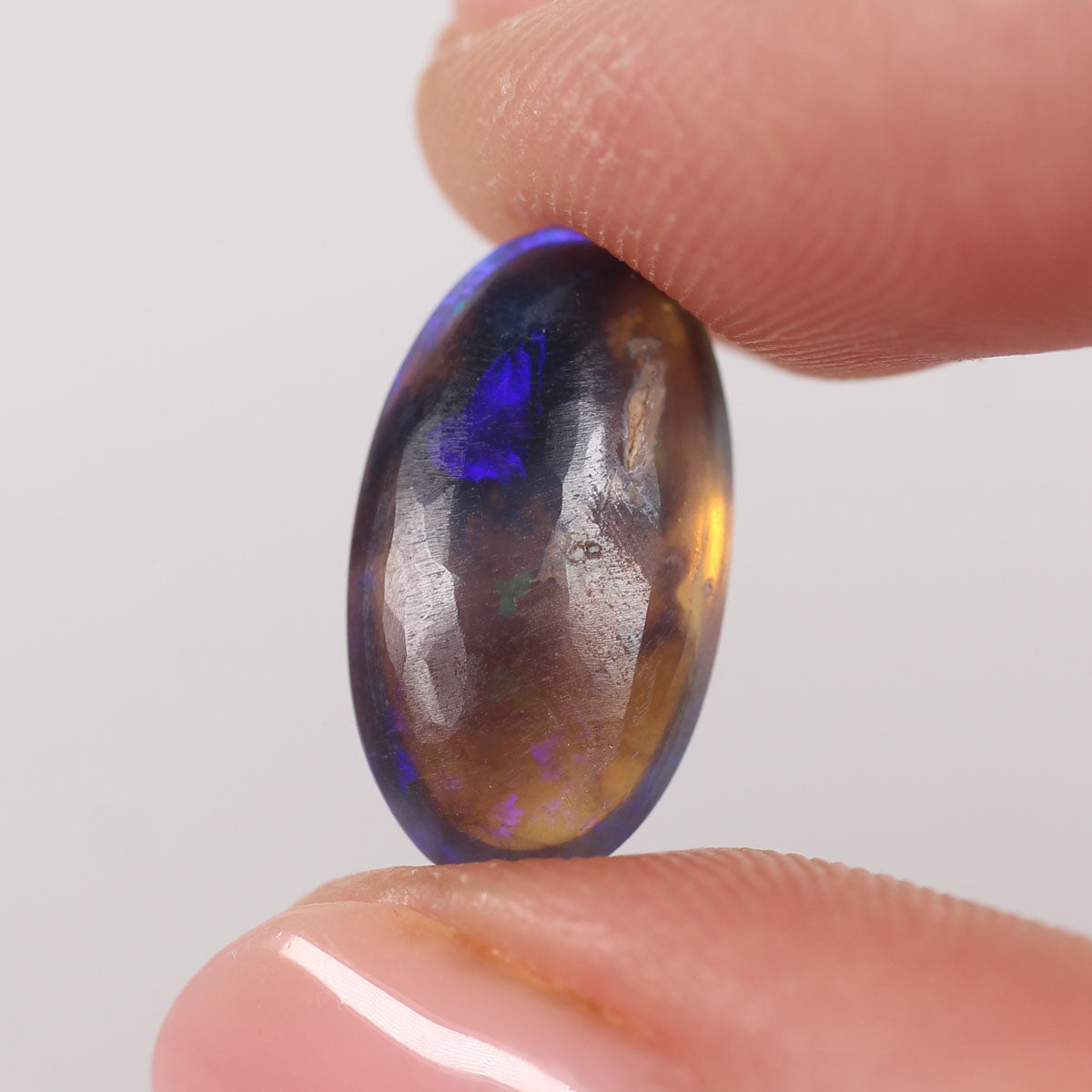 4.57ct Black Opal - 8.7 x 15.5 x 5.9mm