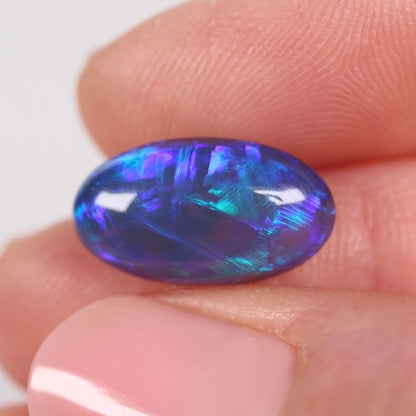 4.57ct Black Opal - 8.7 x 15.5 x 5.9mm
