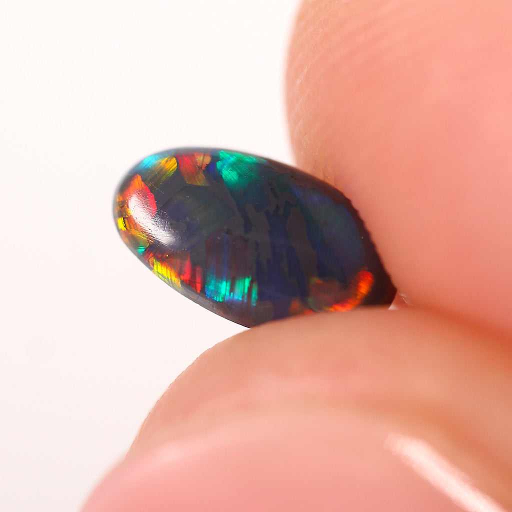 0.48ct Black Opal - 4.3 x 7.5 x 2.5mm