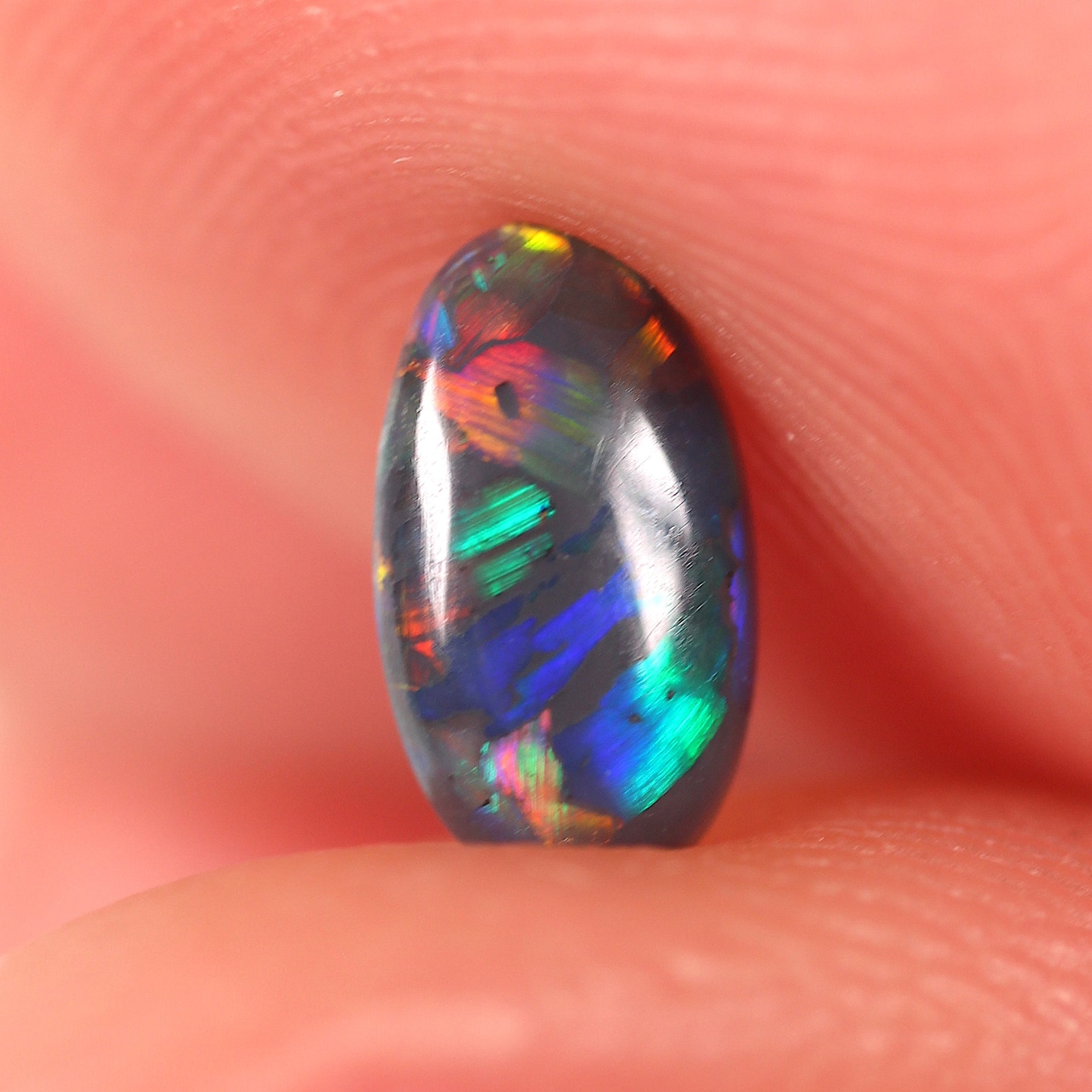 0.48ct Black Opal - 4.3 x 7.5 x 2.5mm