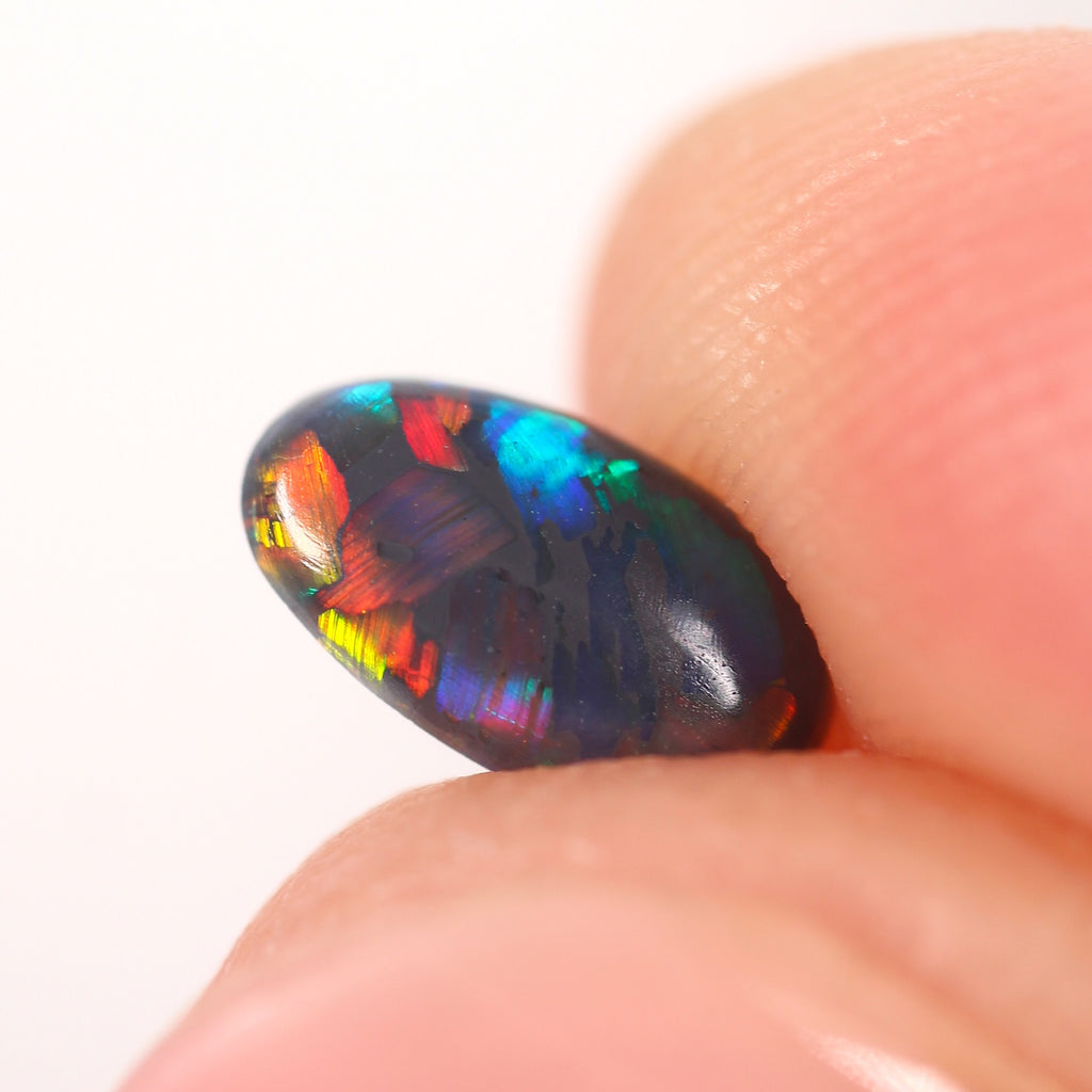 0.48ct Black Opal - 4.3 x 7.5 x 2.5mm