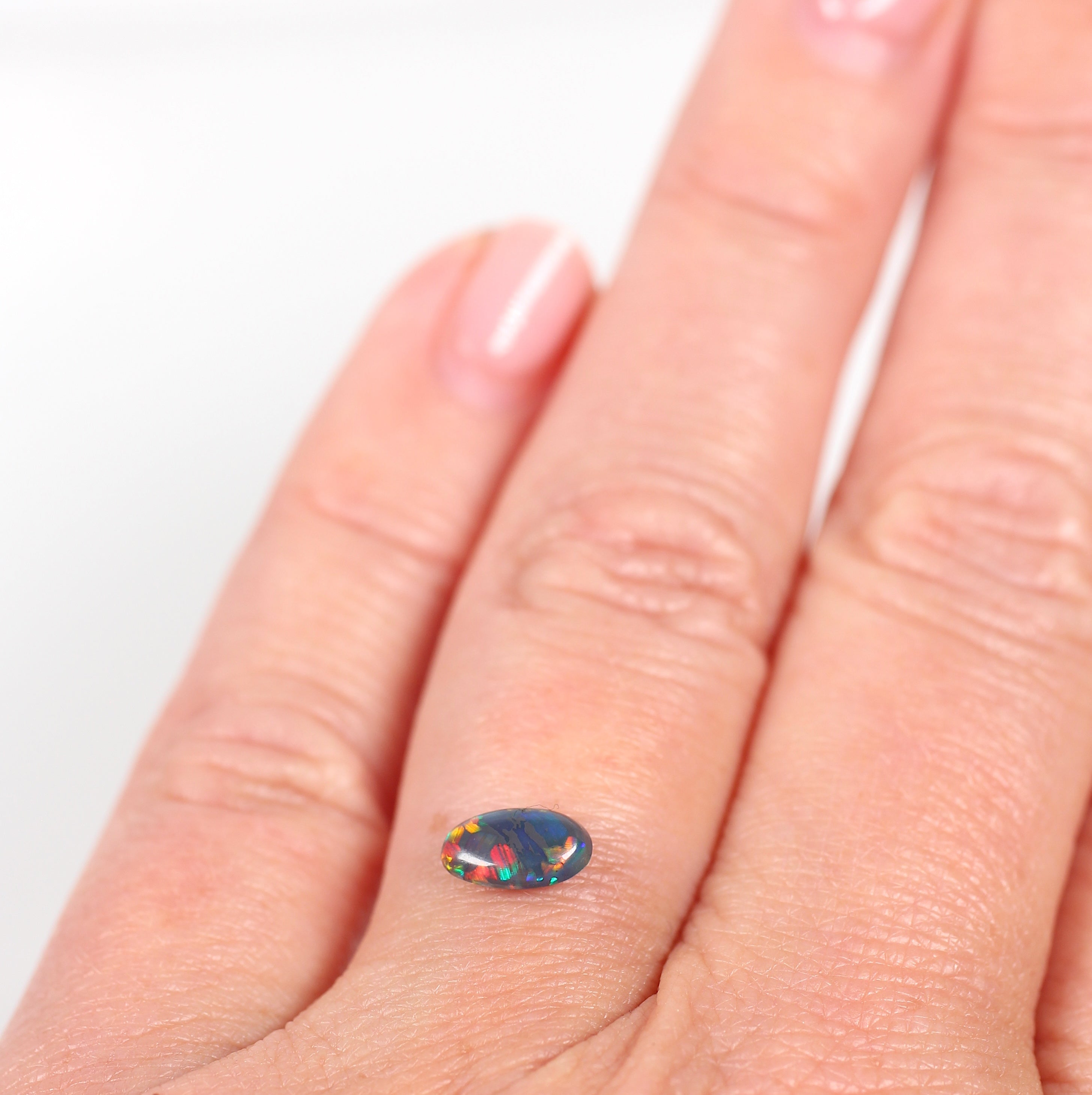 0.48ct Black Opal - 4.3 x 7.5 x 2.5mm