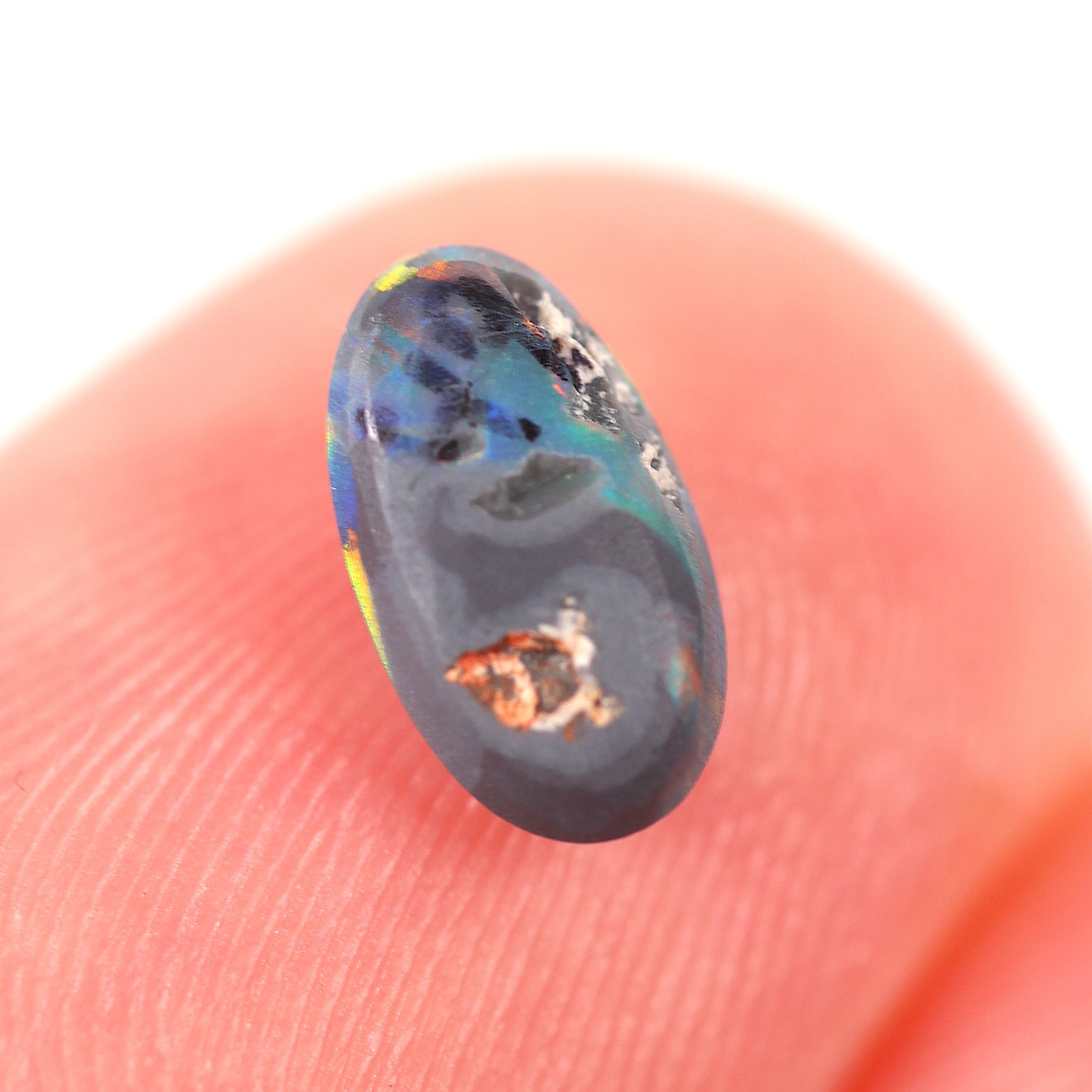 0.48ct Black Opal - 4.3 x 7.5 x 2.5mm