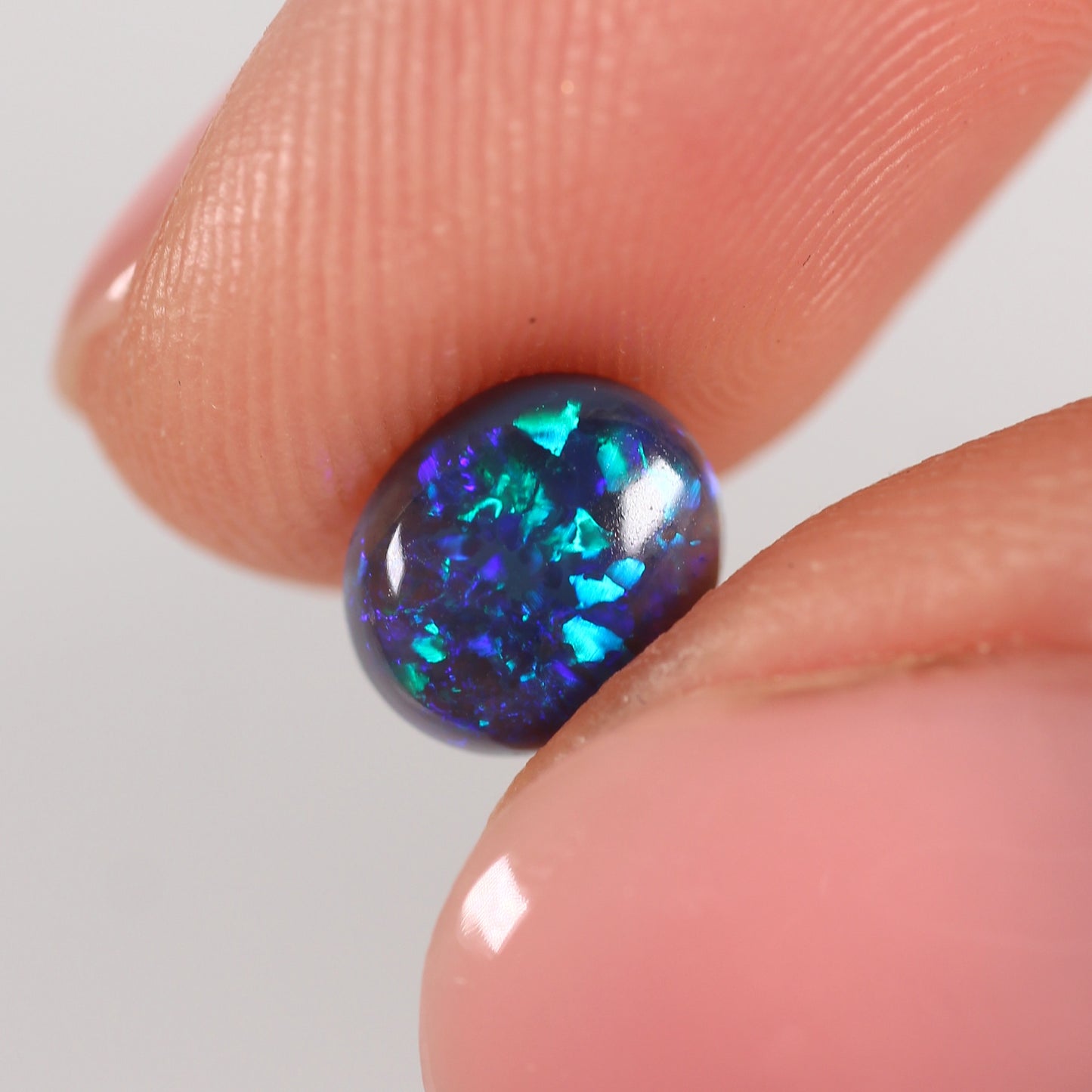 1.23ct Black Opal - 6.7 x 7.8 x 4.10mm