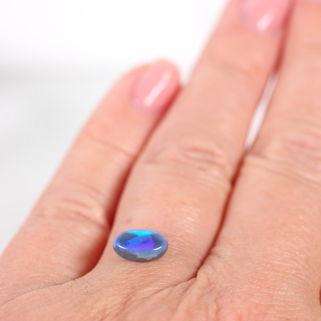 0.85ct Black Opal - 5.4 x 7.8 x 2.8mm