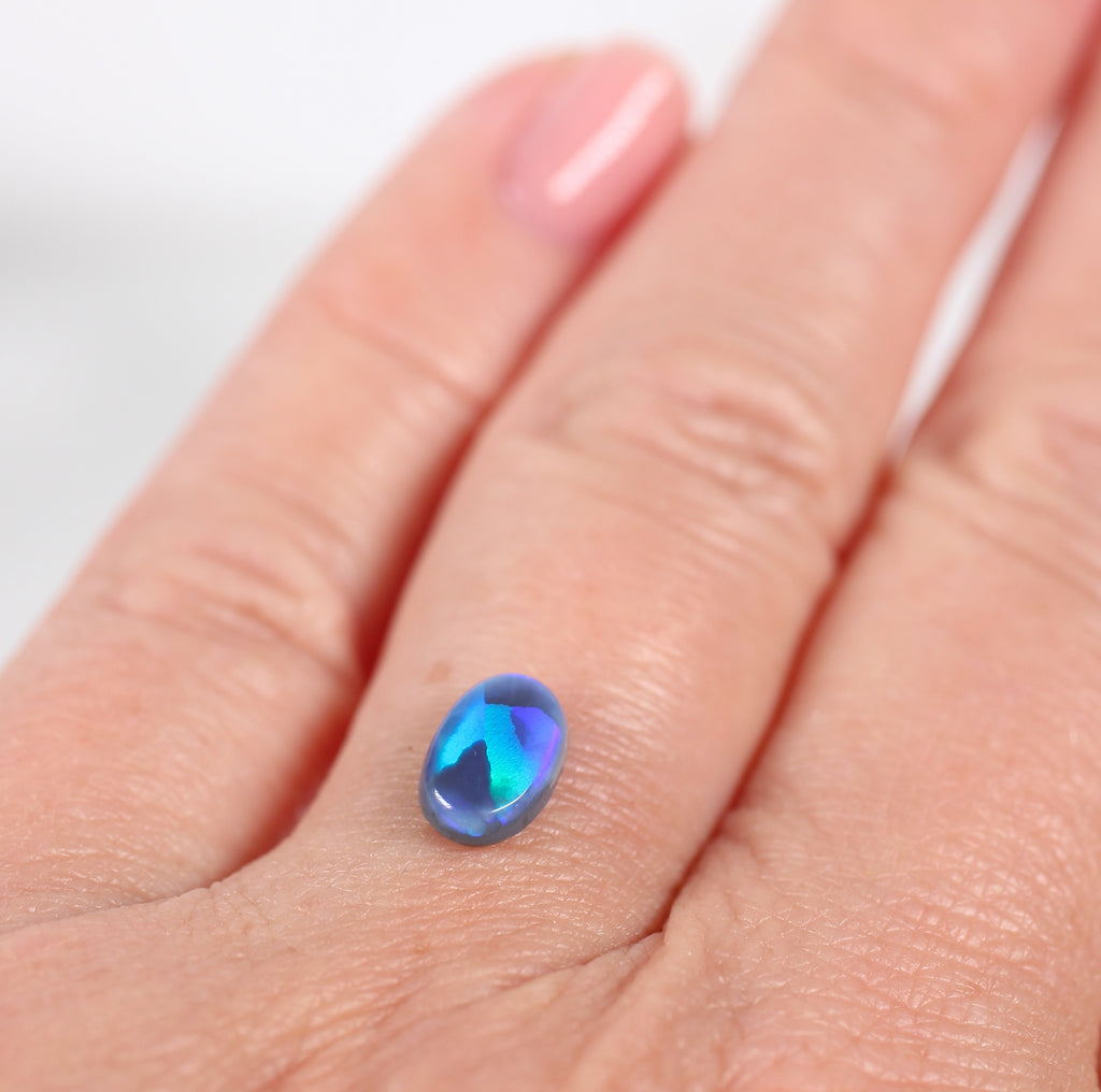 0.85ct Black Opal - 5.4 x 7.8 x 2.8mm