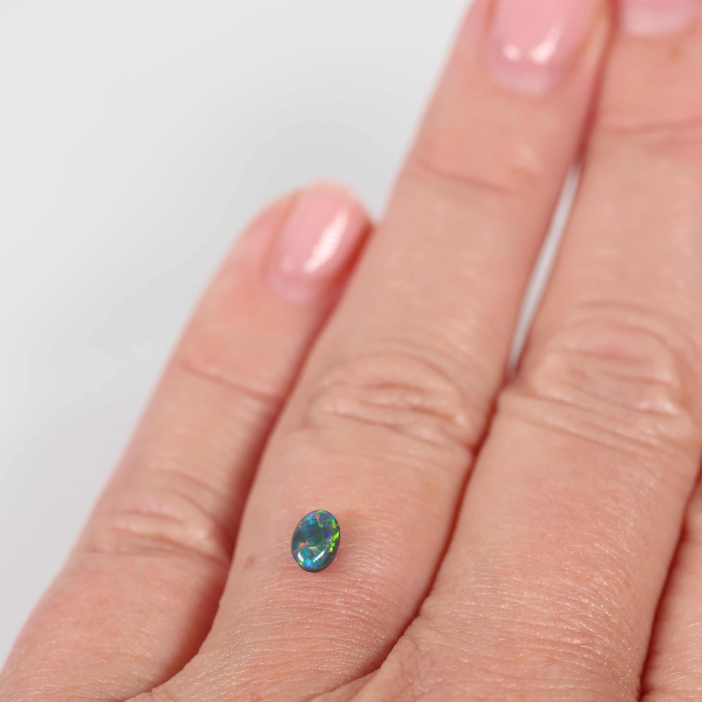 0.32ct Black Opal - 3.7 x 4.9 x 2.8mm