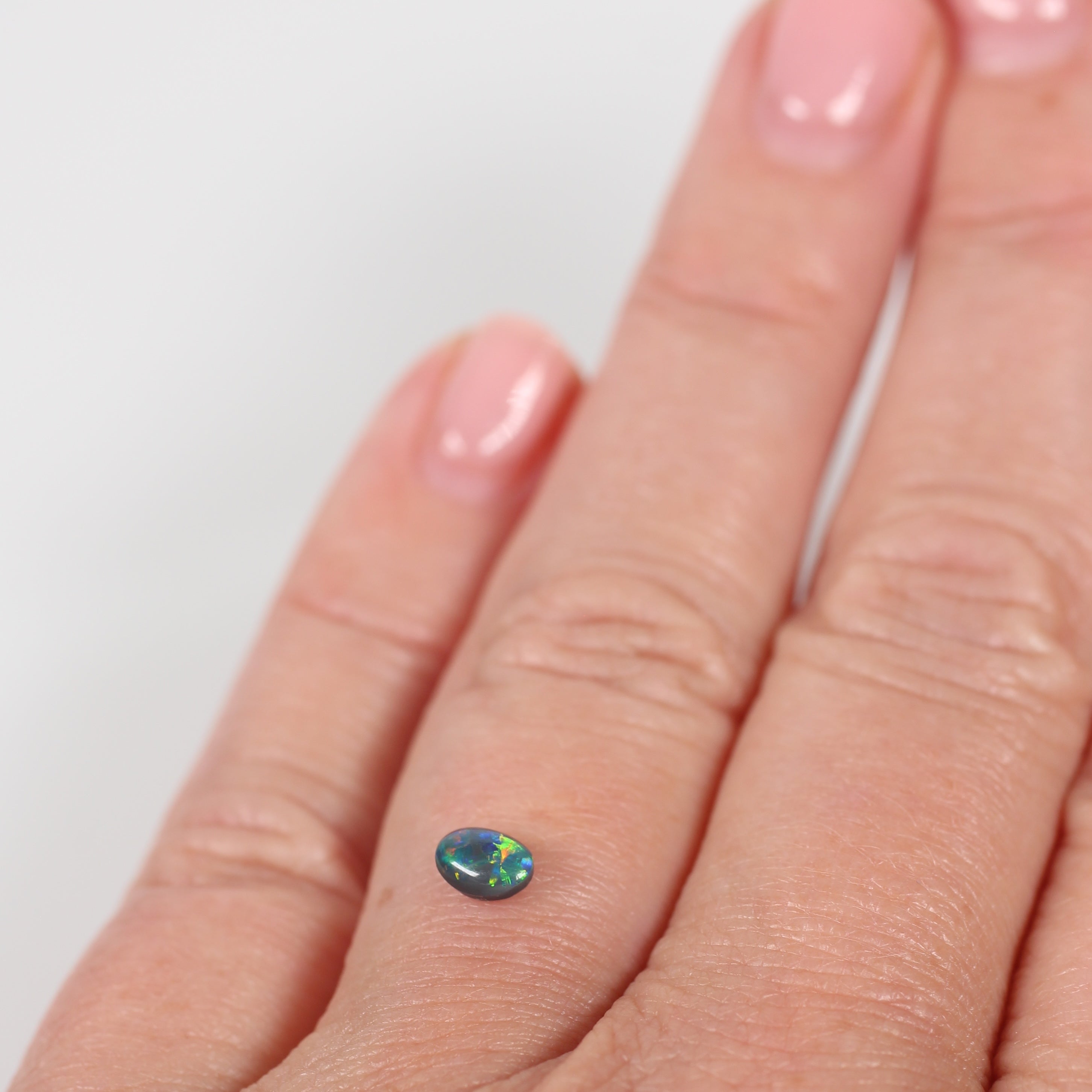 0.32ct Black Opal - 3.7 x 4.9 x 2.8mm