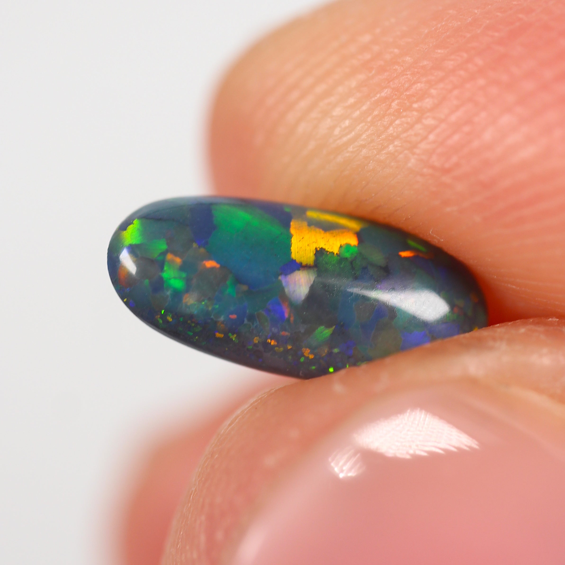 0.82ct Black Opal - 10 x 4.5 x 3mm