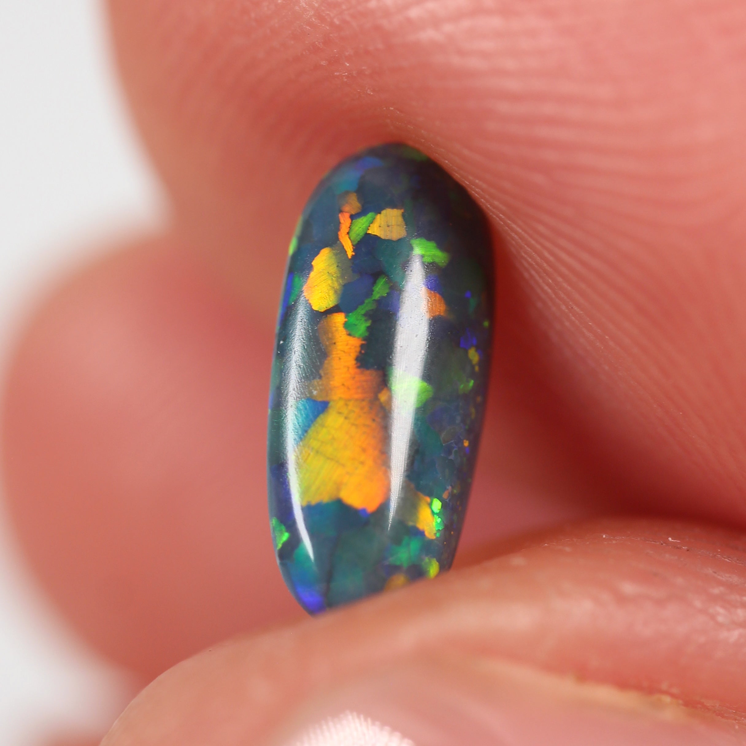 0.82ct Black Opal - 10 x 4.5 x 3mm