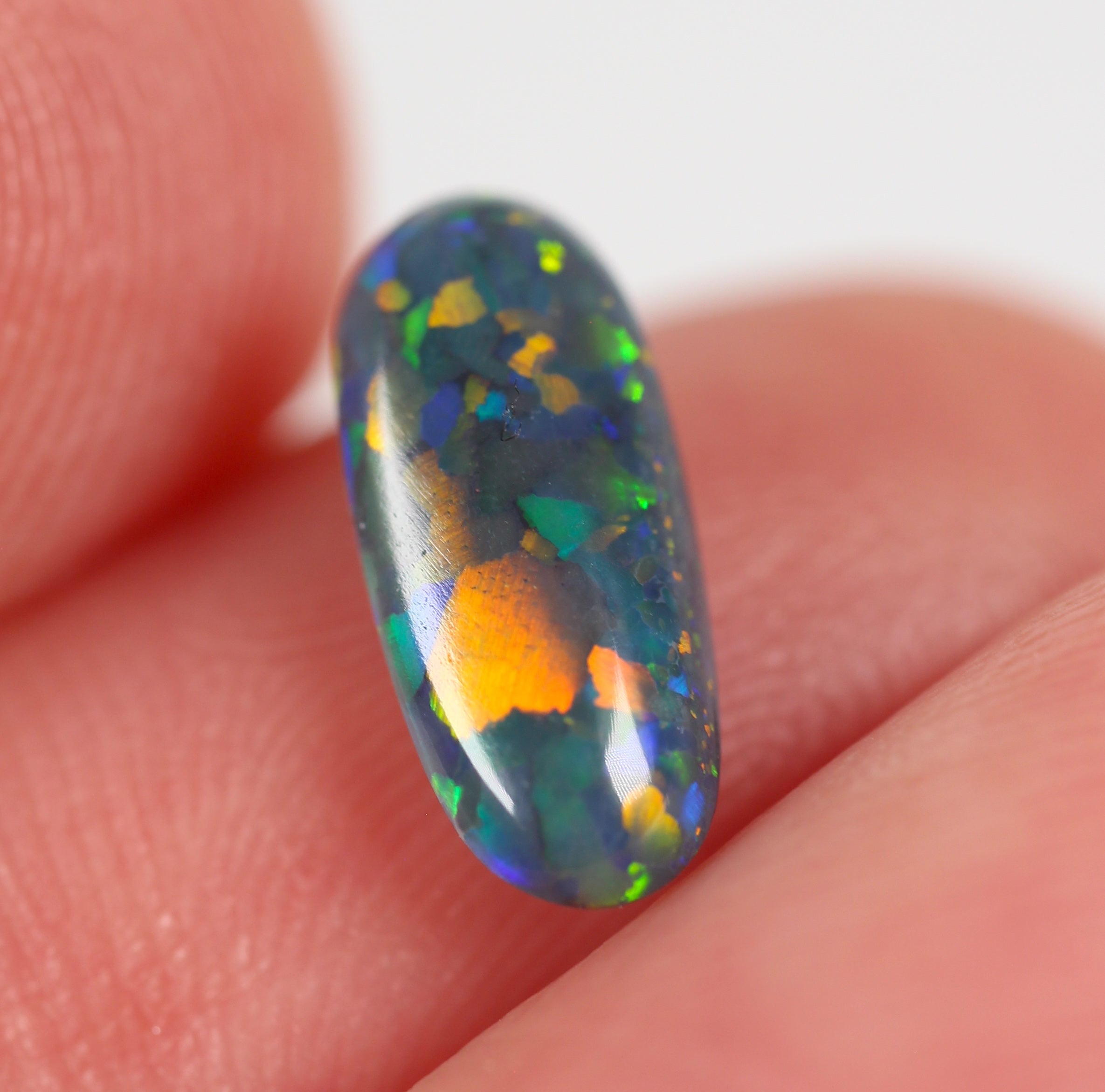 0.82ct Black Opal - 10 x 4.5 x 3mm