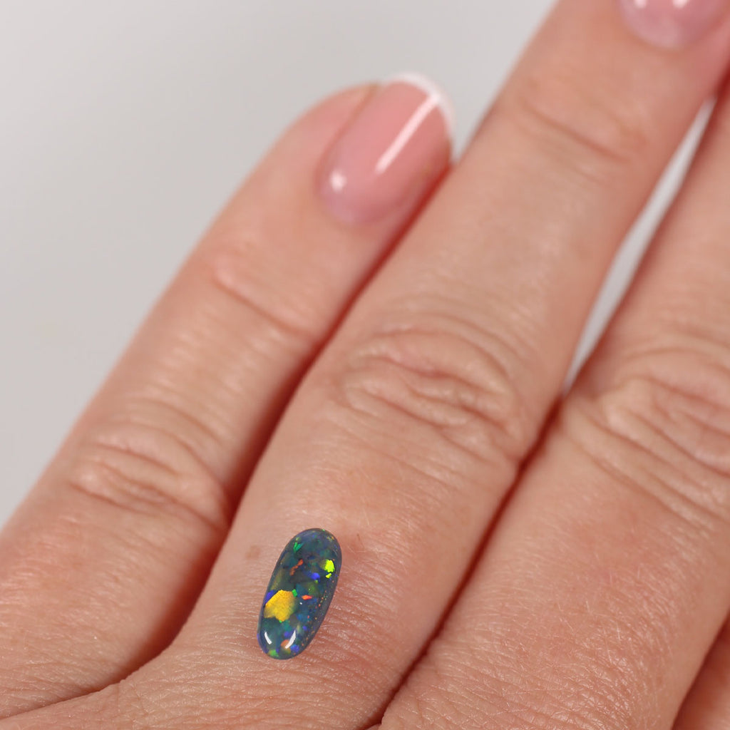 0.82ct Black Opal - 10 x 4.5 x 3mm