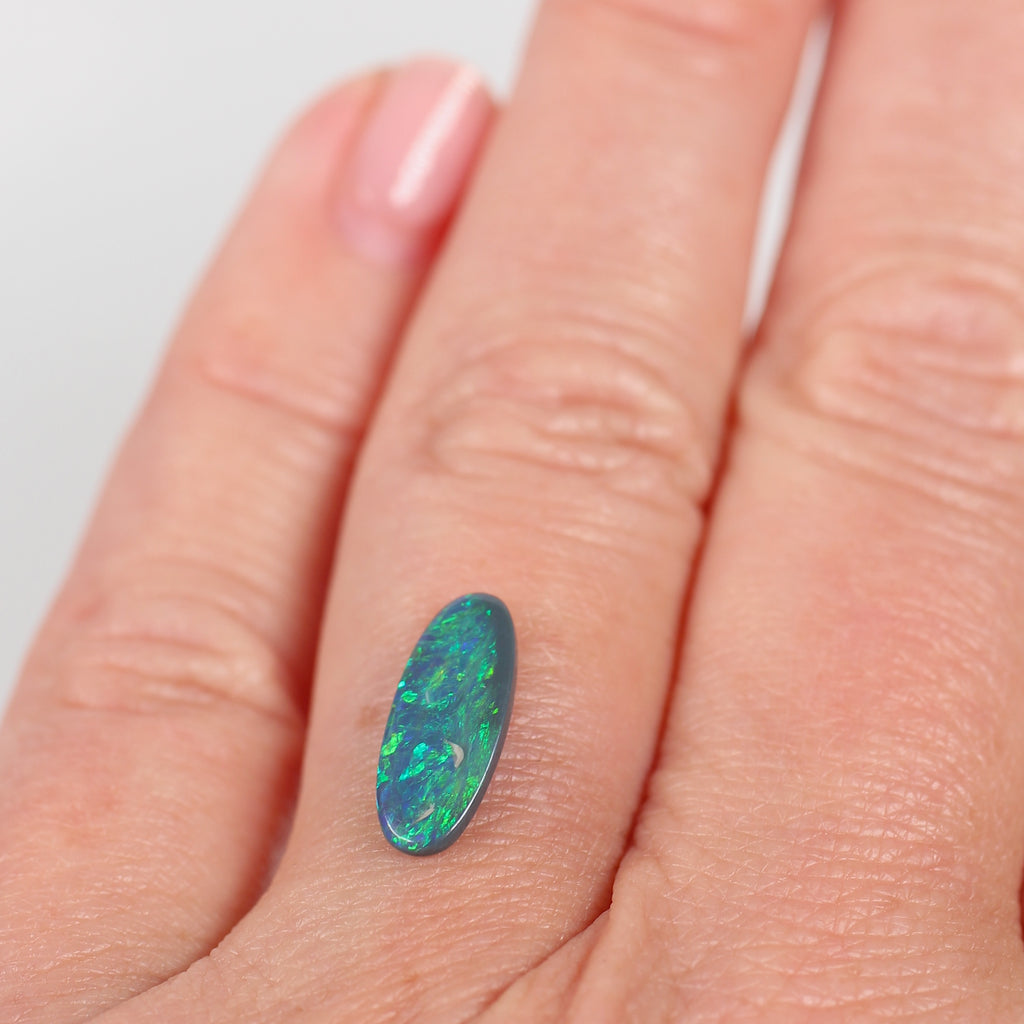 1.10ct Black Opal - 5.5 x 13 x 2.2mm