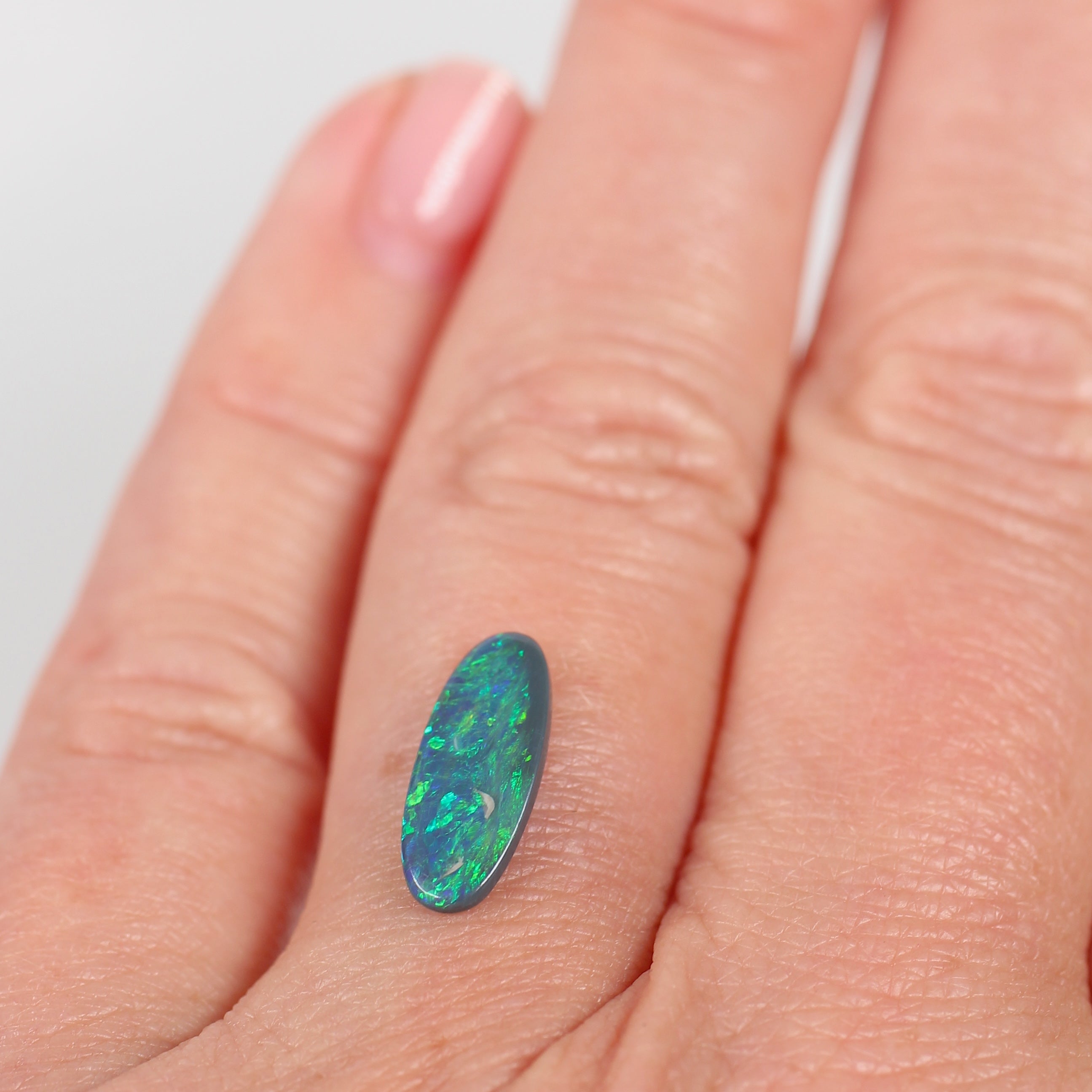 1.10ct Black Opal - 5.5 x 13 x 2.2mm
