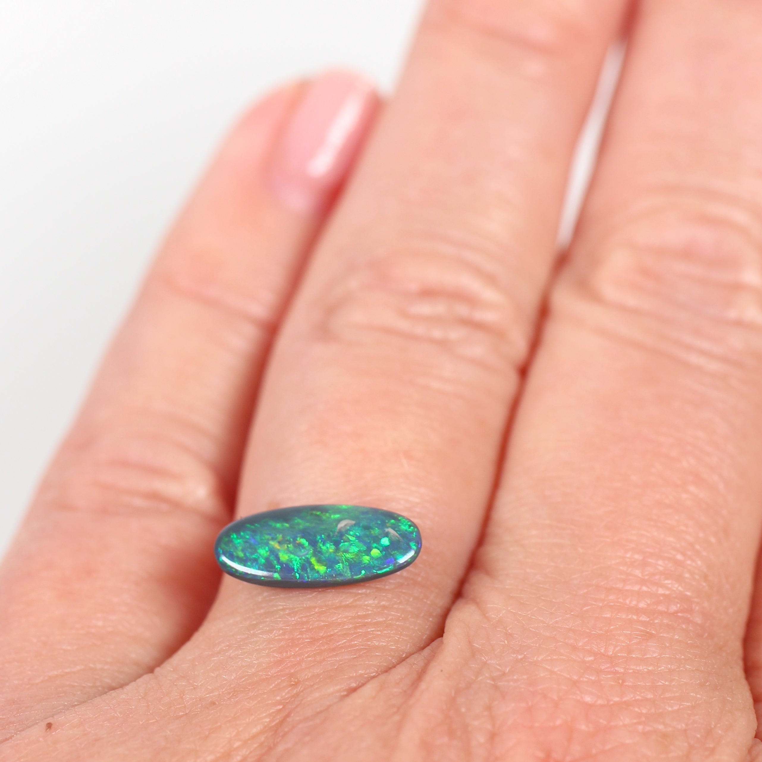 1.10ct Black Opal - 5.5 x 13 x 2.2mm