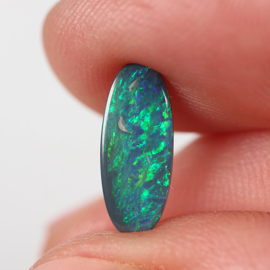 1.10ct Black Opal - 5.5 x 13 x 2.2mm