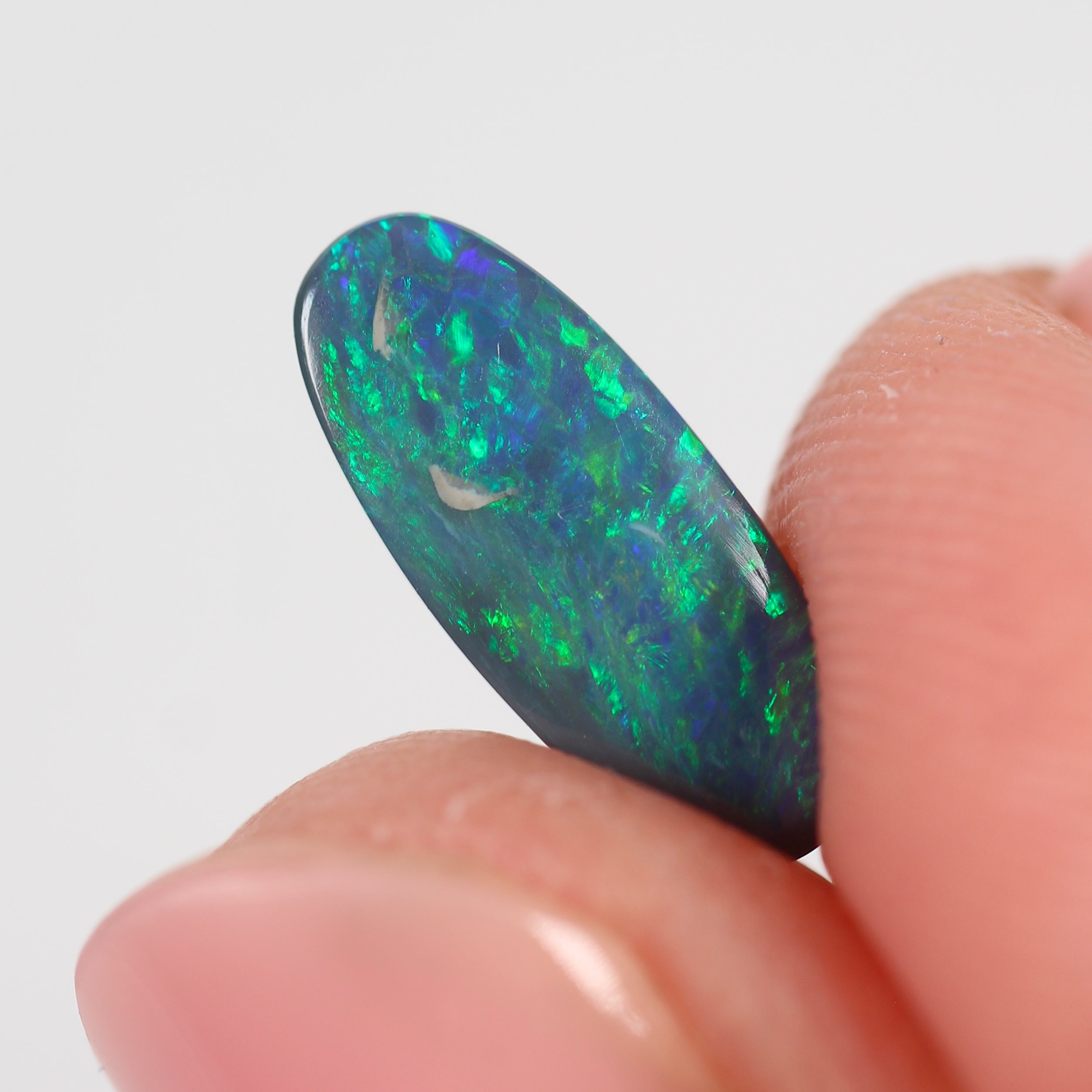 1.10ct Black Opal - 5.5 x 13 x 2.2mm