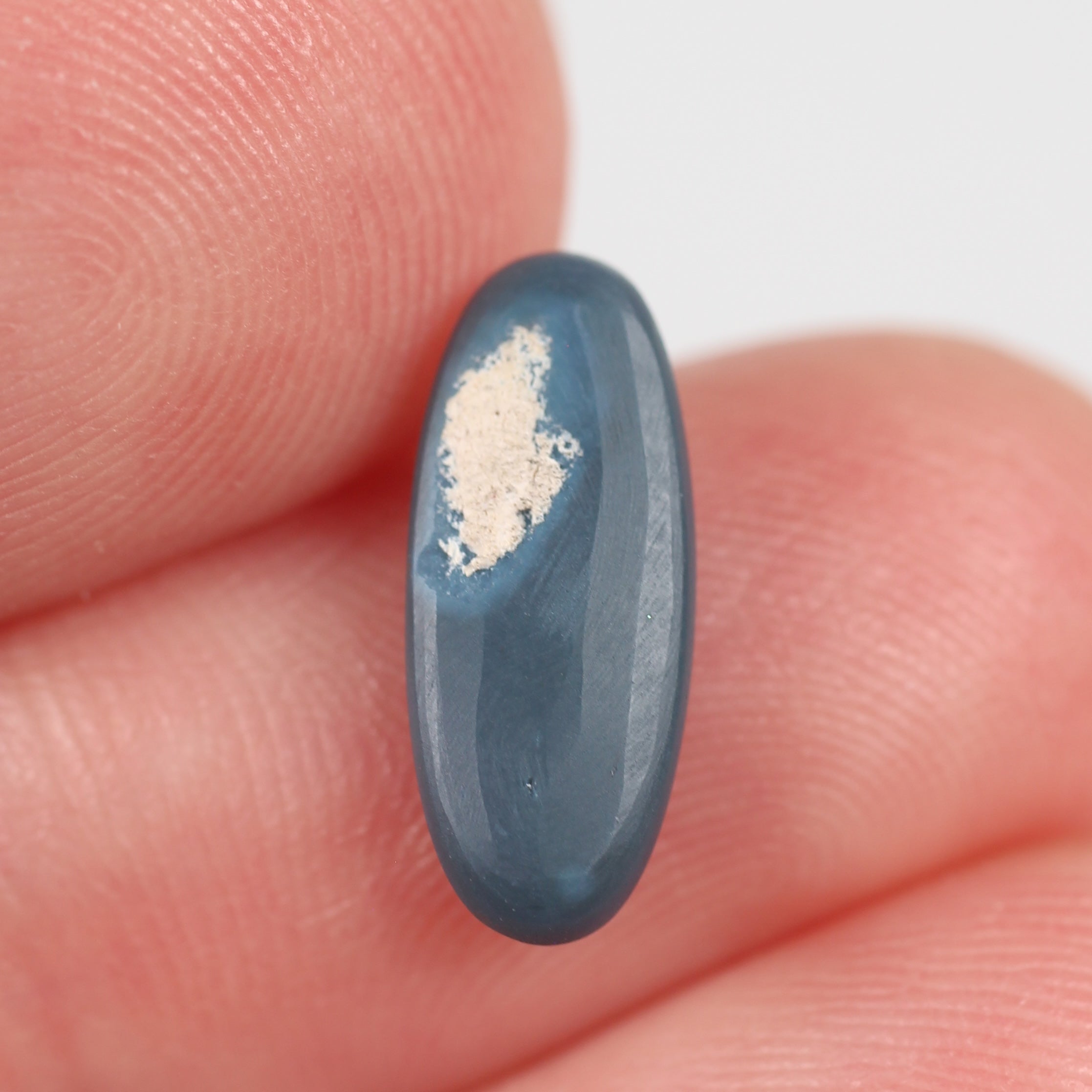 1.10ct Black Opal - 5.5 x 13 x 2.2mm