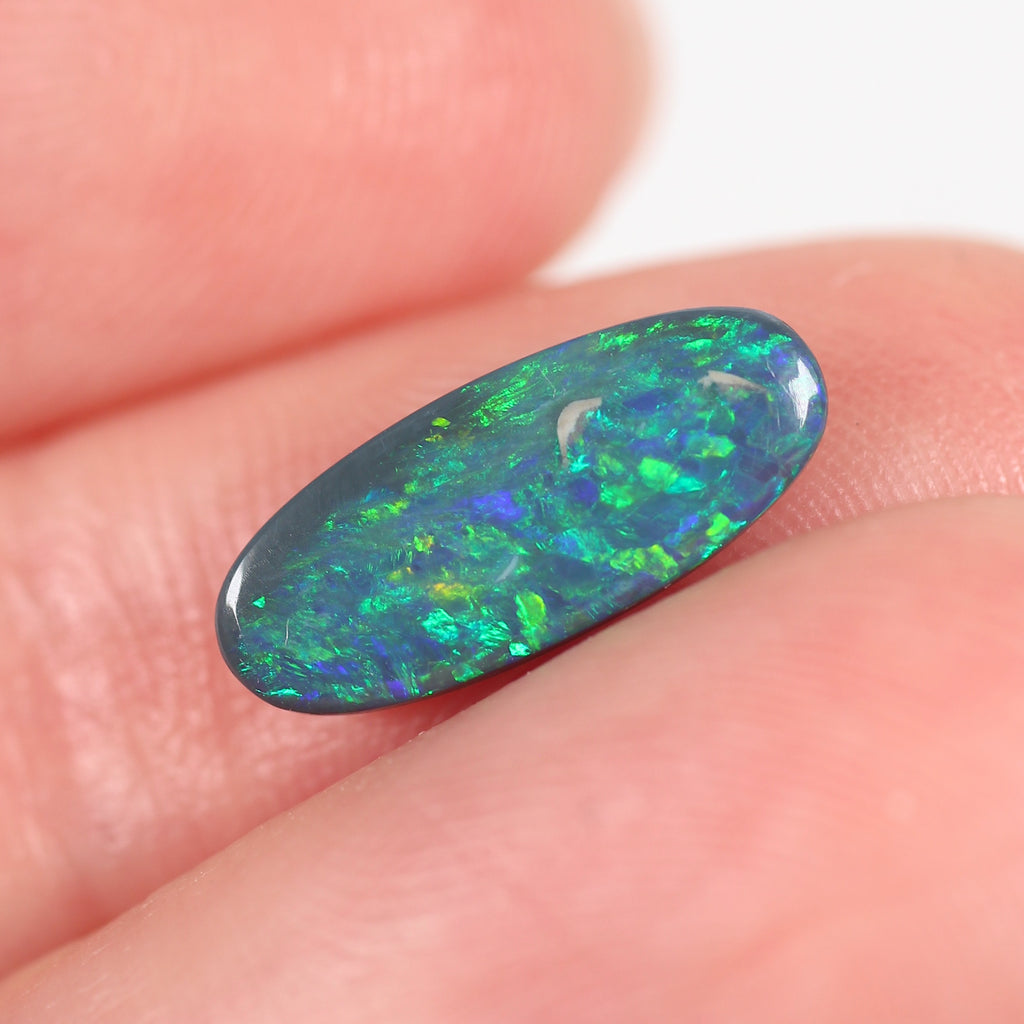 1.10ct Black Opal - 5.5 x 13 x 2.2mm
