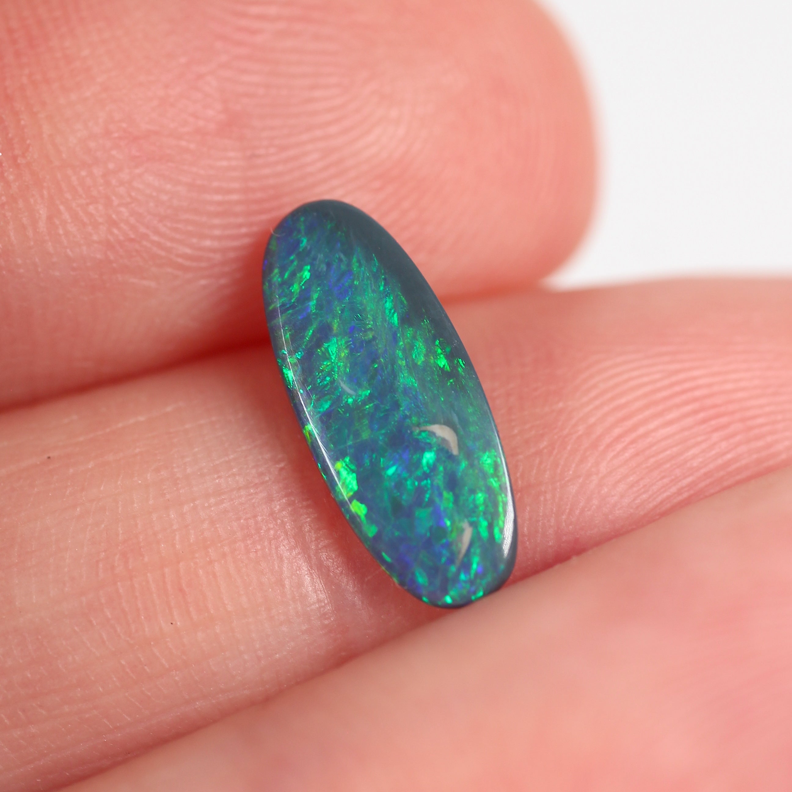 1.10ct Black Opal - 5.5 x 13 x 2.2mm