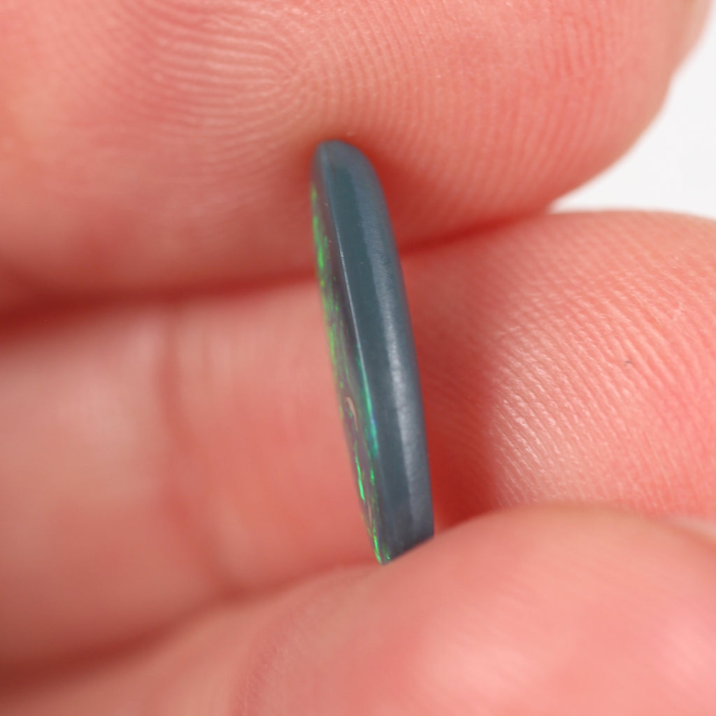 1.10ct Black Opal - 5.5 x 13 x 2.2mm