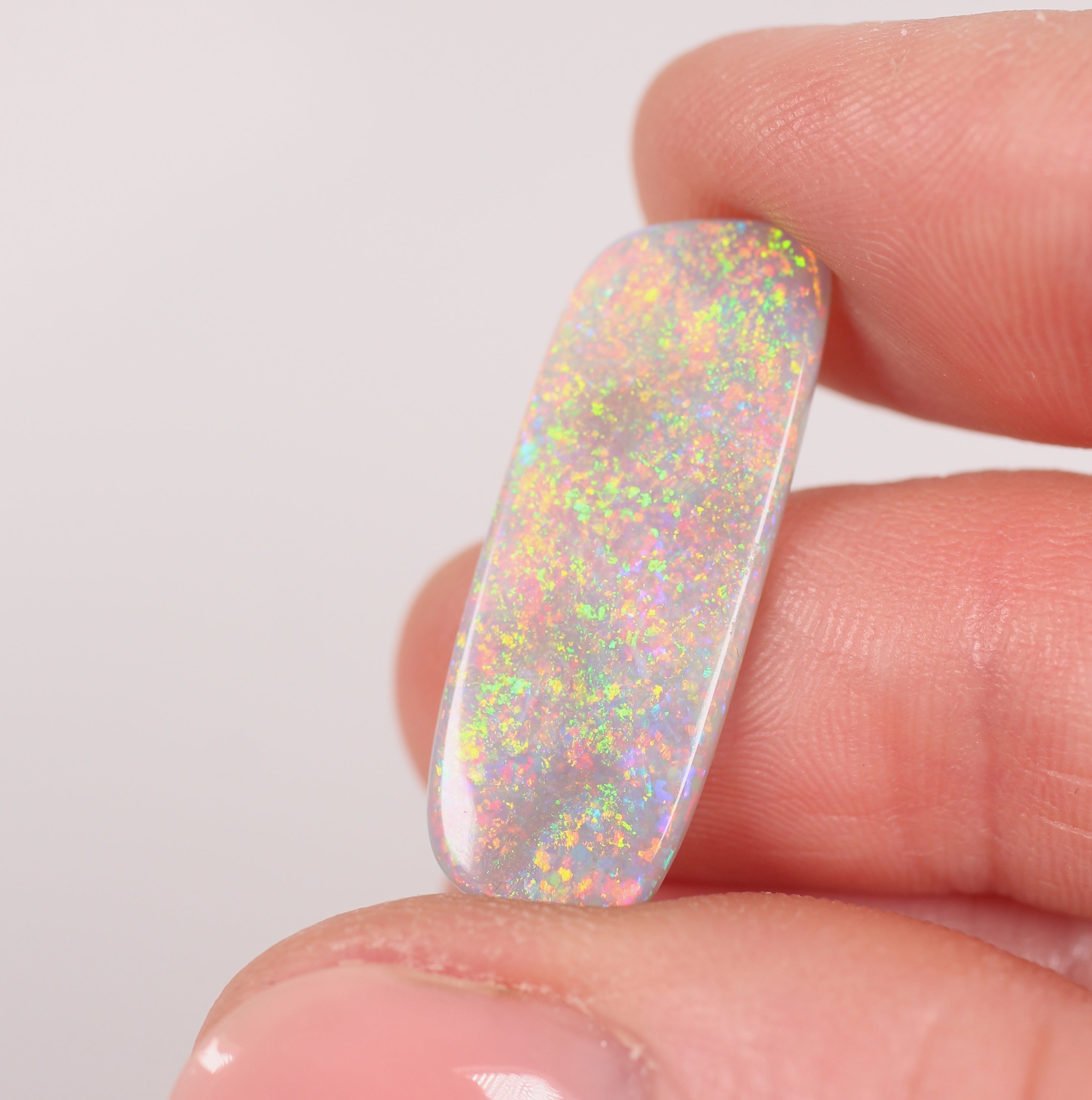 5.23ct Dark Opal - 10.2 x 27.6 x 2.5mm