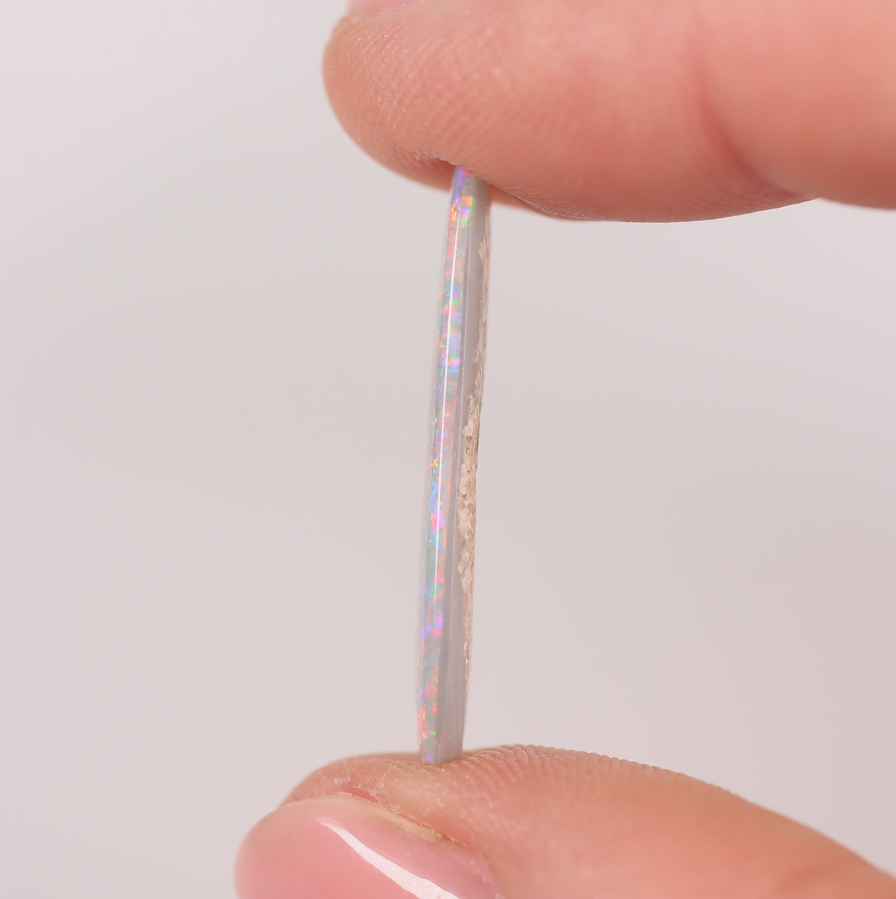 5.23ct Dark Opal - 10.2 x 27.6 x 2.5mm