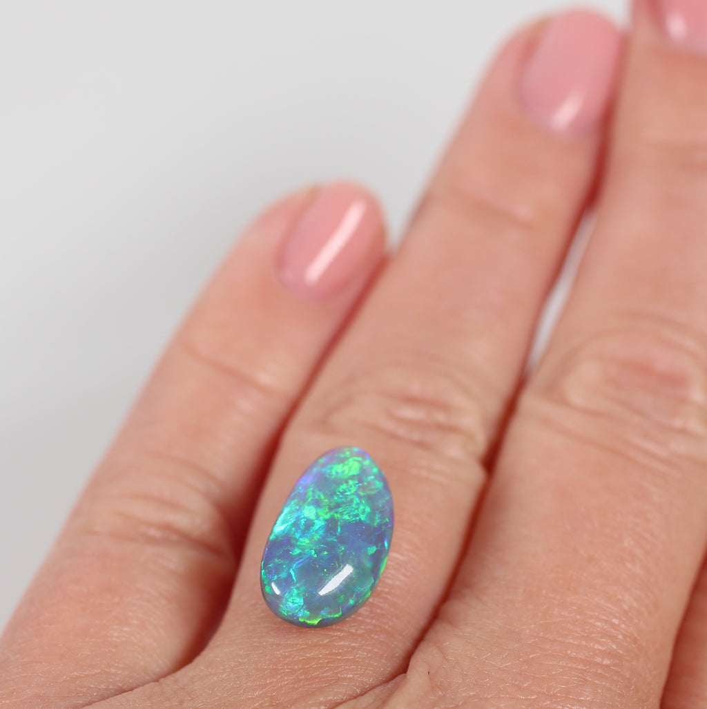 5.47ct Black Opal - 9 x 15.8 x 6.3 mm